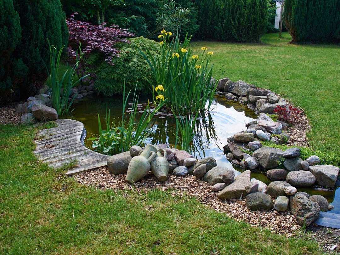 26 Pond Ideas to Transform Your Garden into a Lush Oasis - placeideal.com