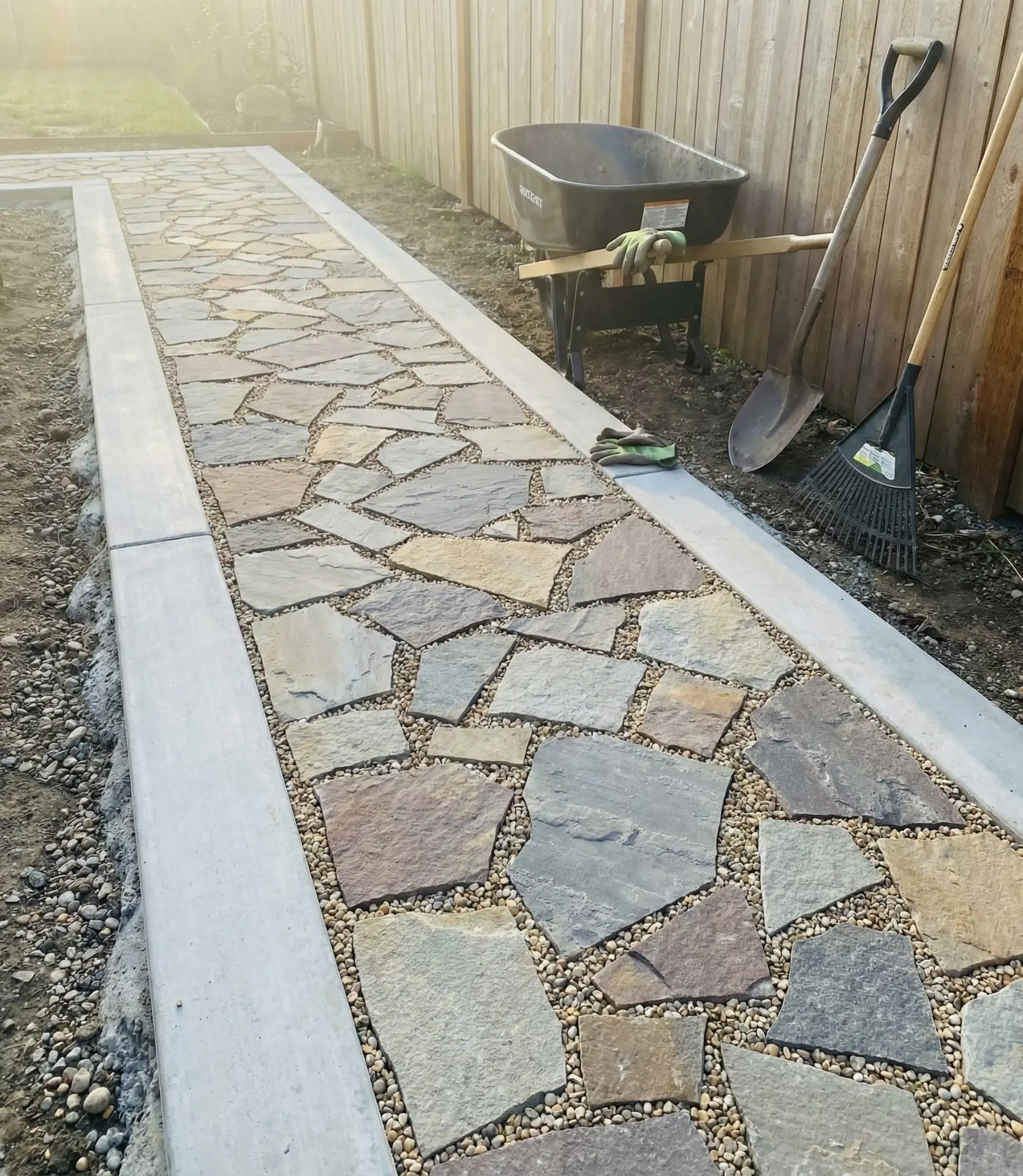 DIY Paver Patio with Gravel and Cement Borders 2