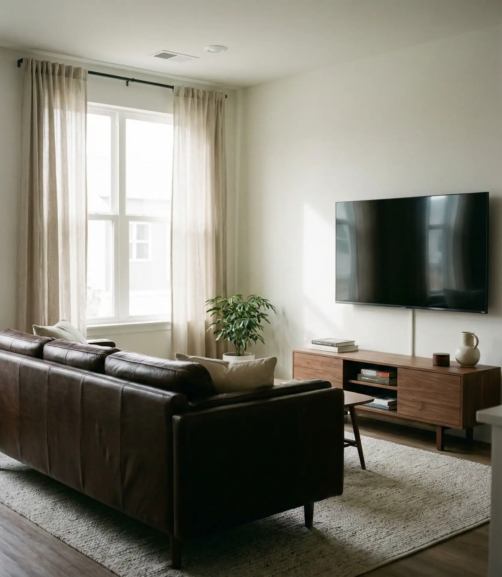 Espresso Sofa with Modern TV Stand Integration 1