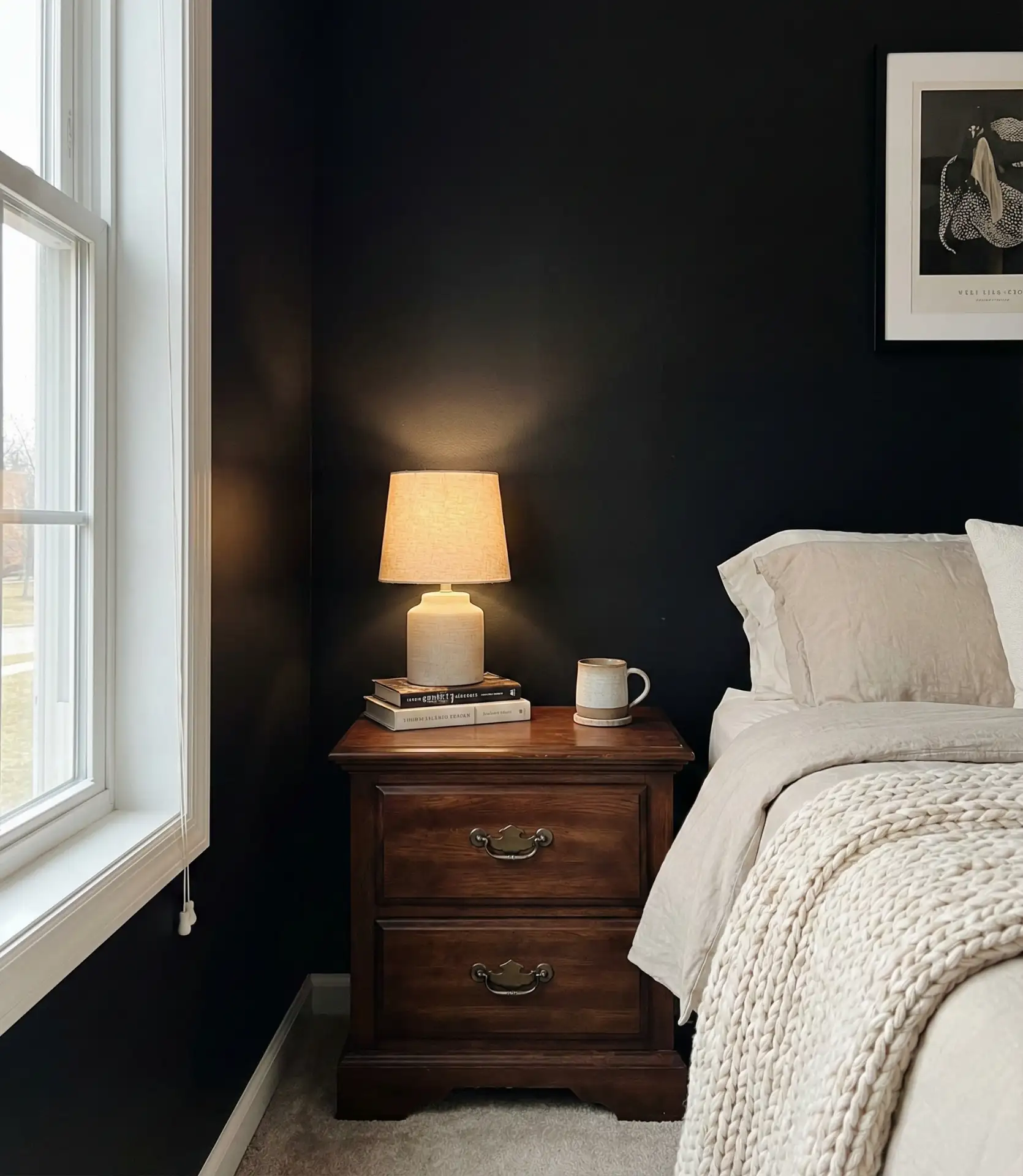 Black Accent Wall with Dark Brown Furniture for Layered Depth 1