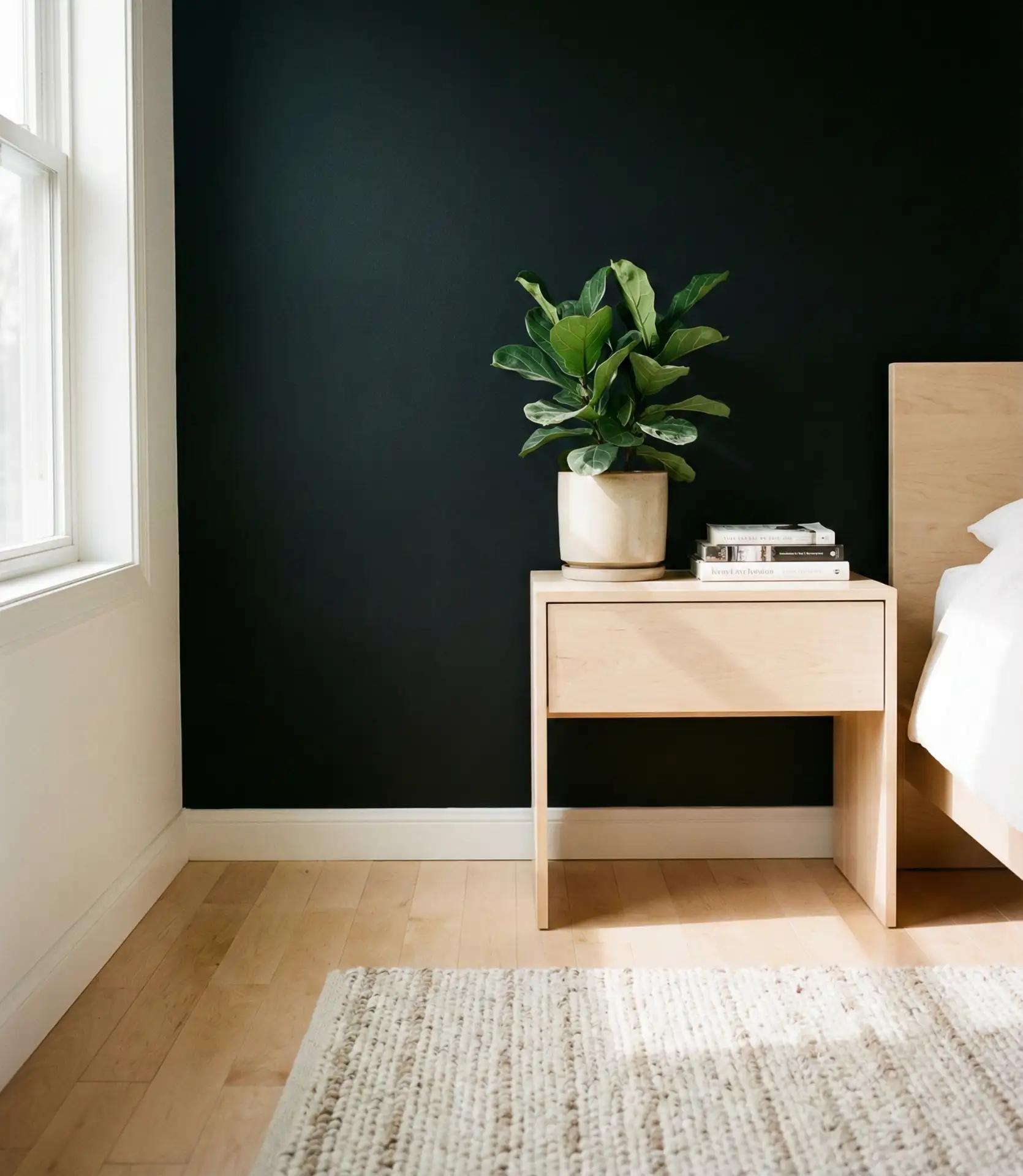 Black Accent Wall with Light Hardwood Floors 1