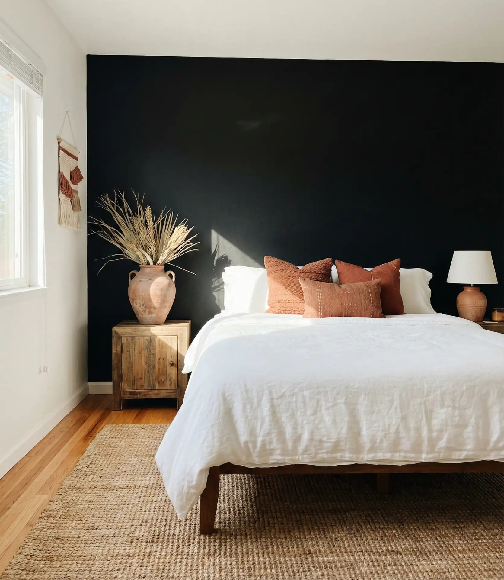 Black Accent Wall with Warm Terracotta Accents 1