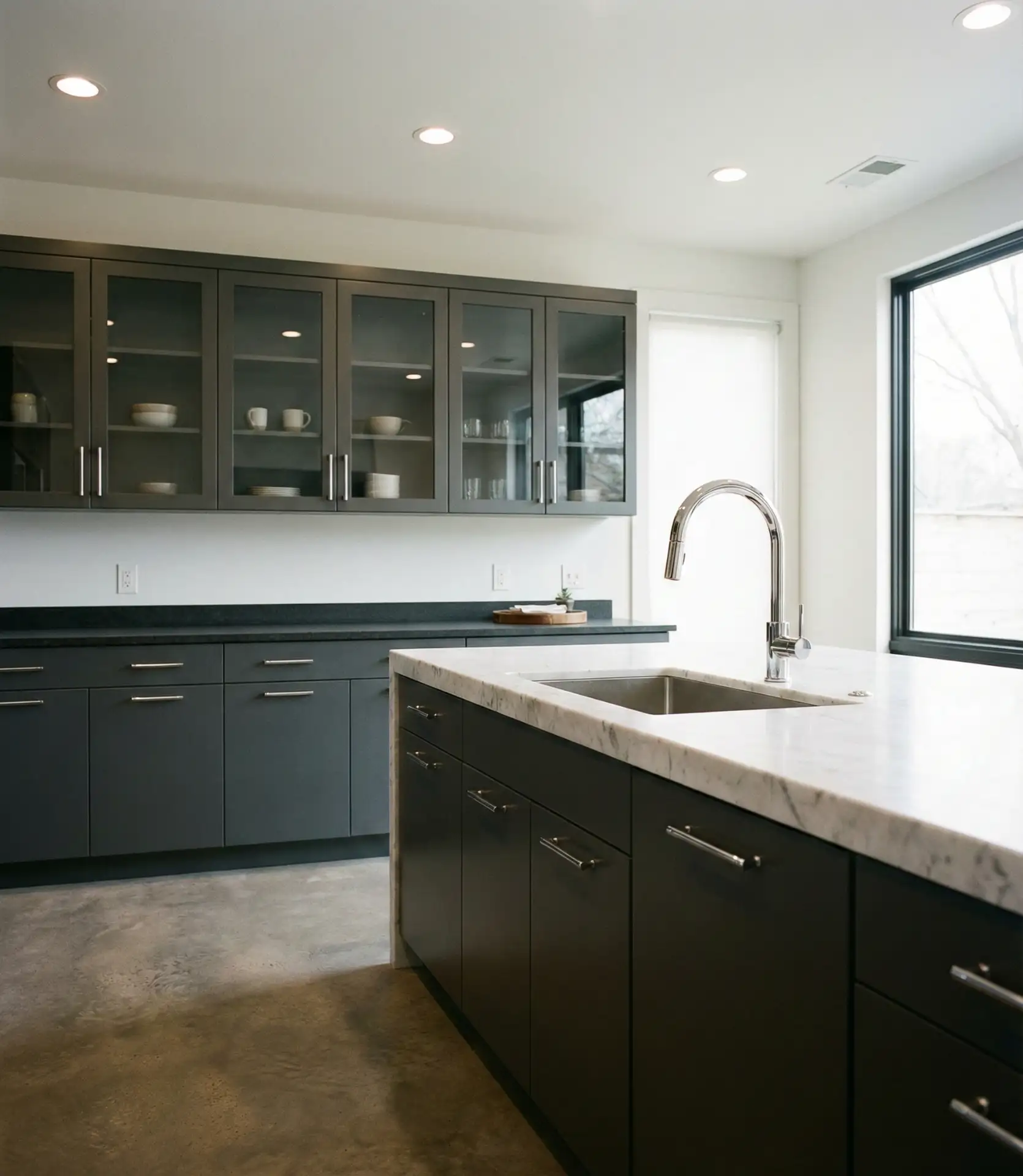 Charcoal Gray Cabinets with Marble Countertops 2
