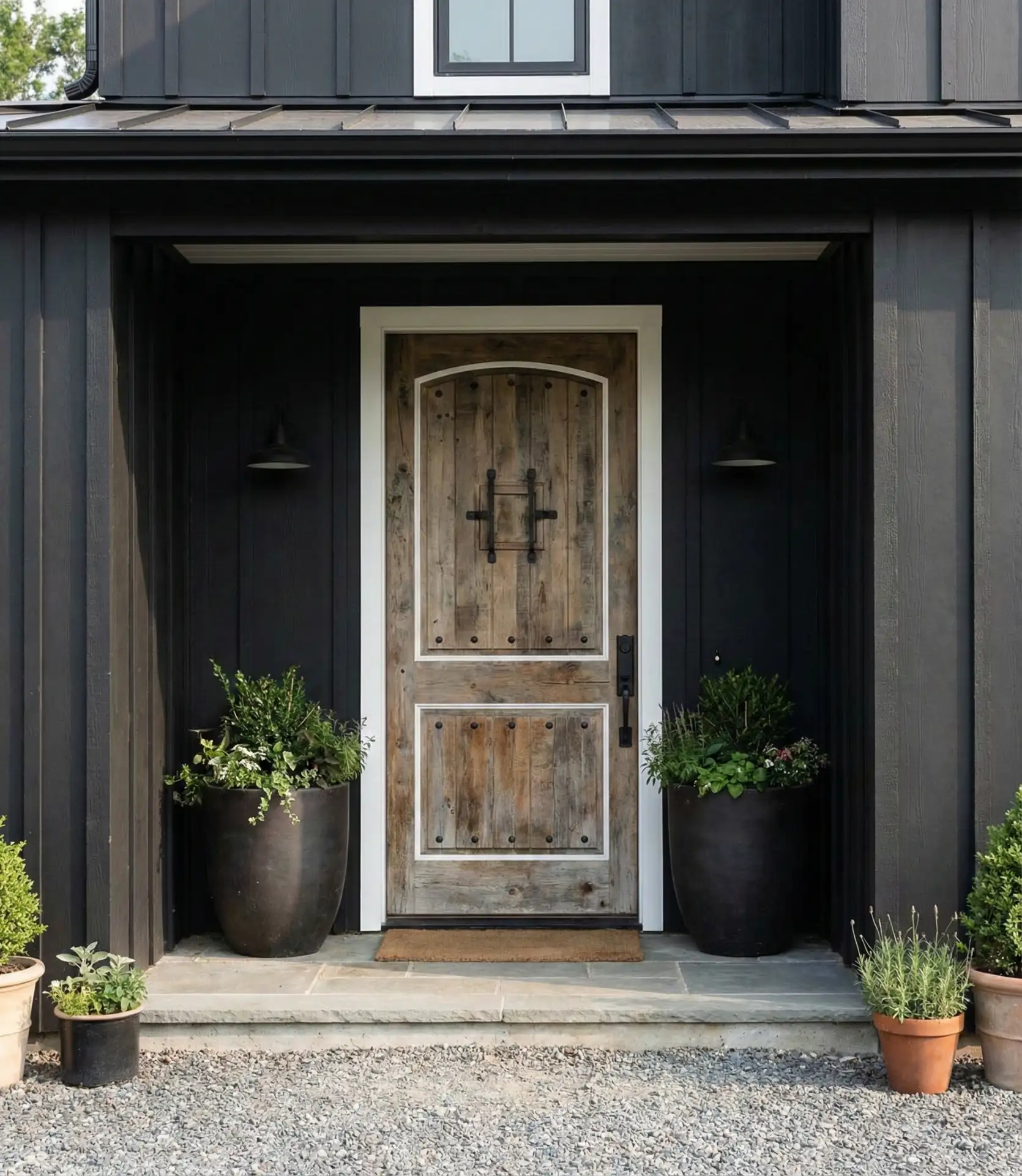 Dramatic Dark Exterior with Natural Wood Door 1