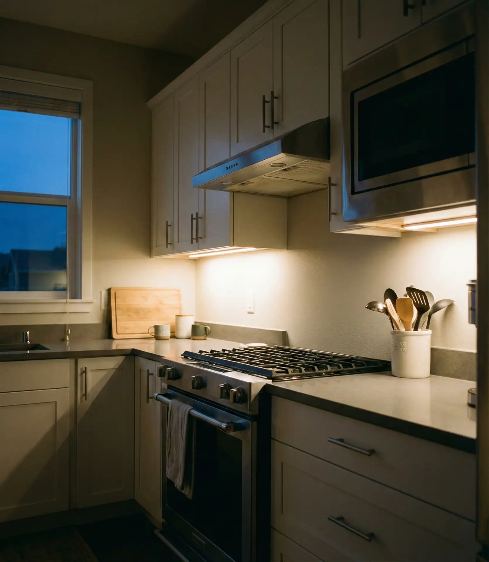 Layered Lighting with Under-Cabinet Strips 1