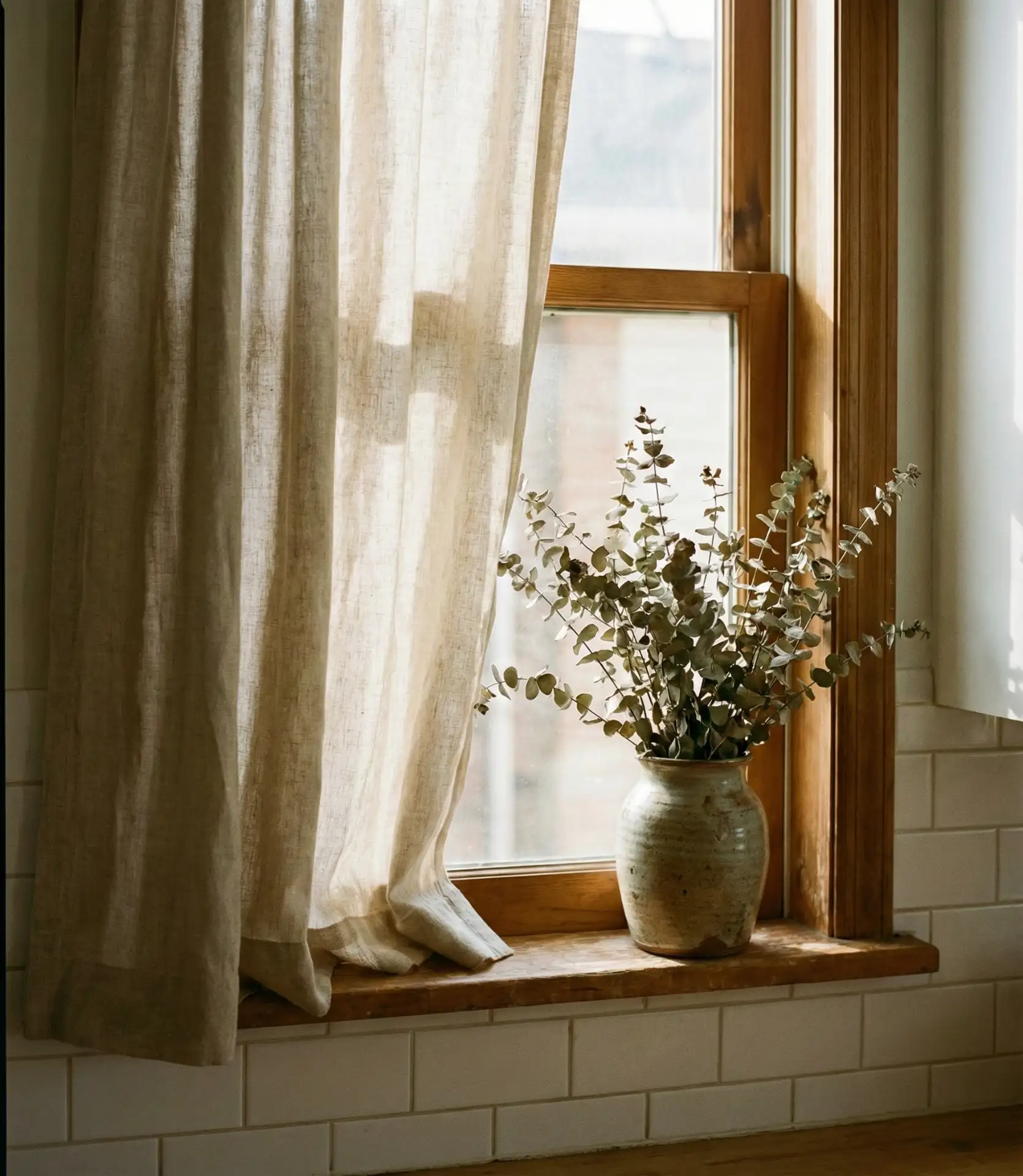 Layered Linen Curtains Over the Sink 1