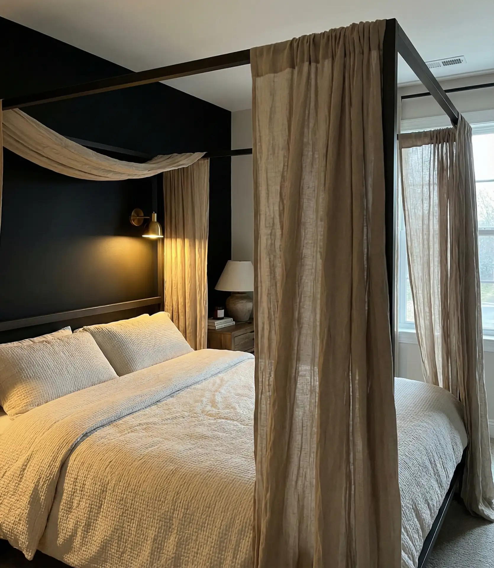 Matte Black Wall Behind a Canopy Bed 2