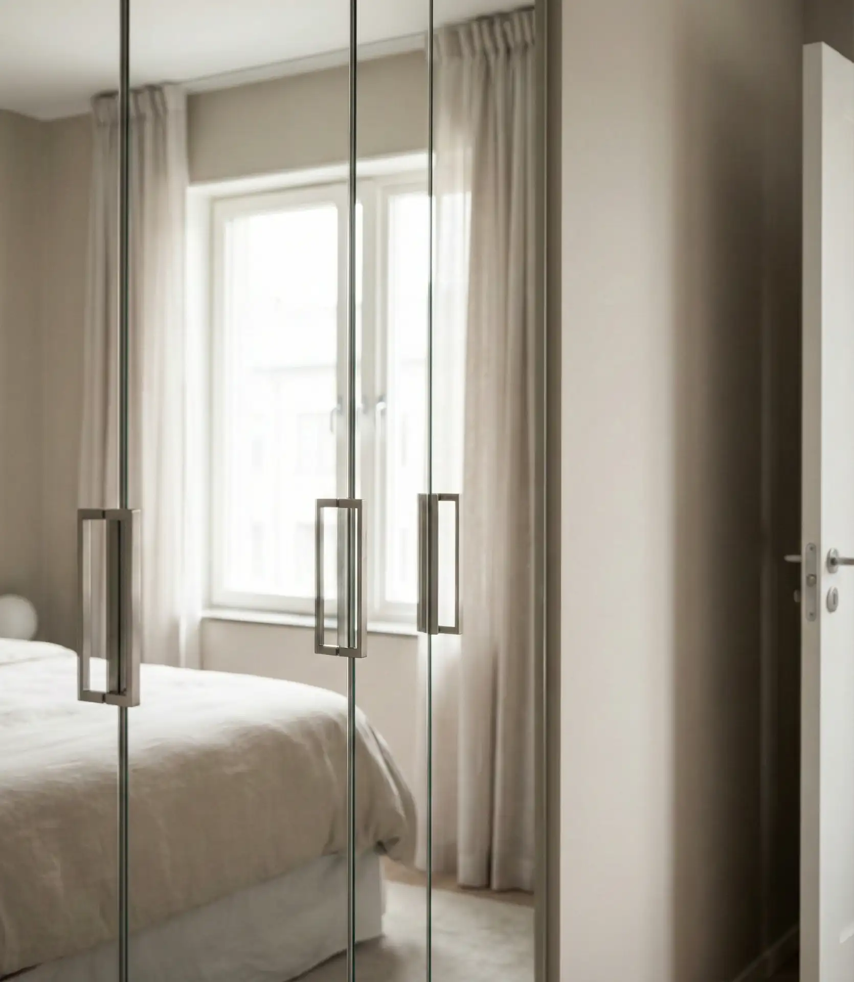 Mirrored Closet Doors to Reflect Light 2