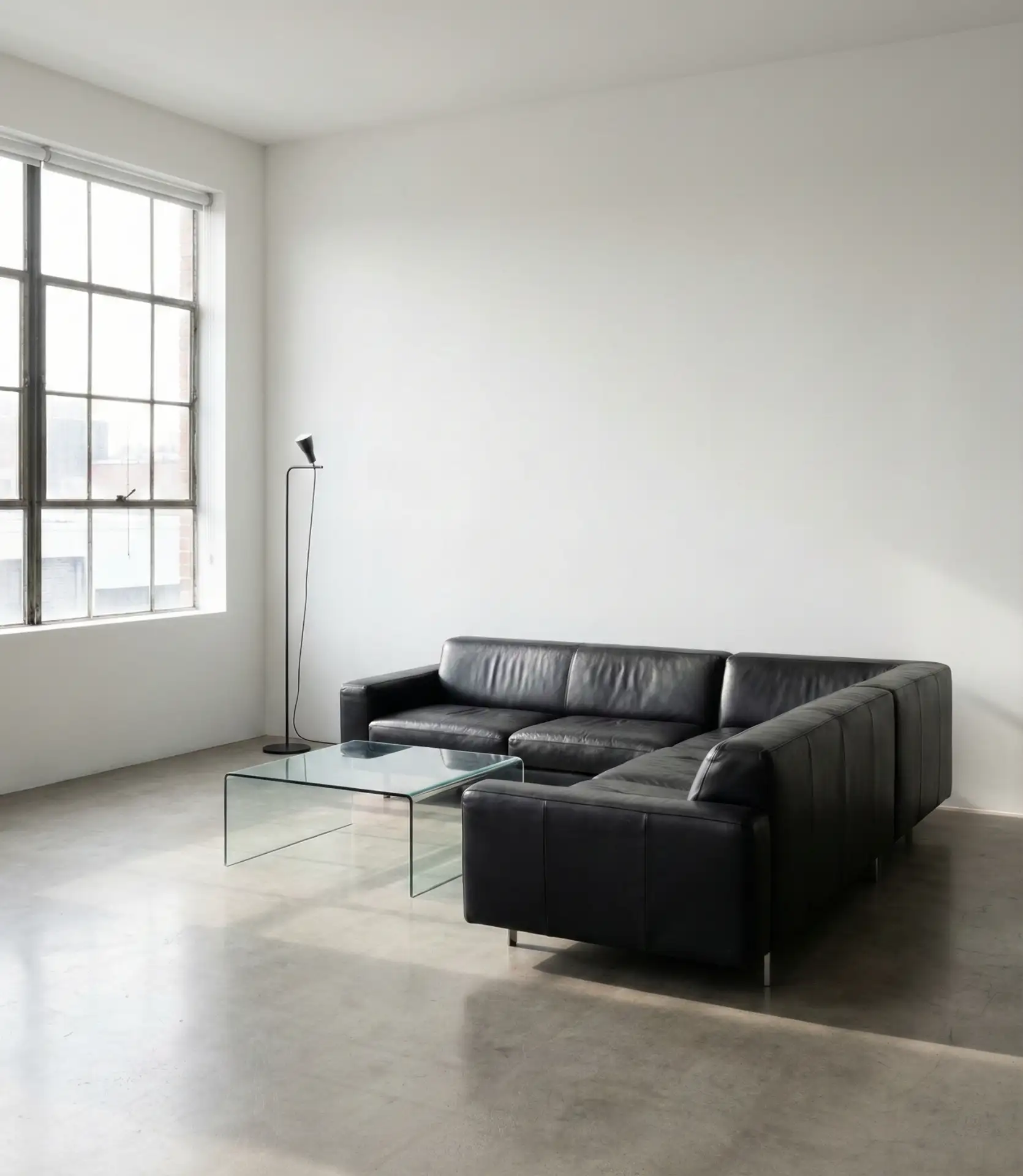 Modern Black Leather Sectional in Minimalist Space 2