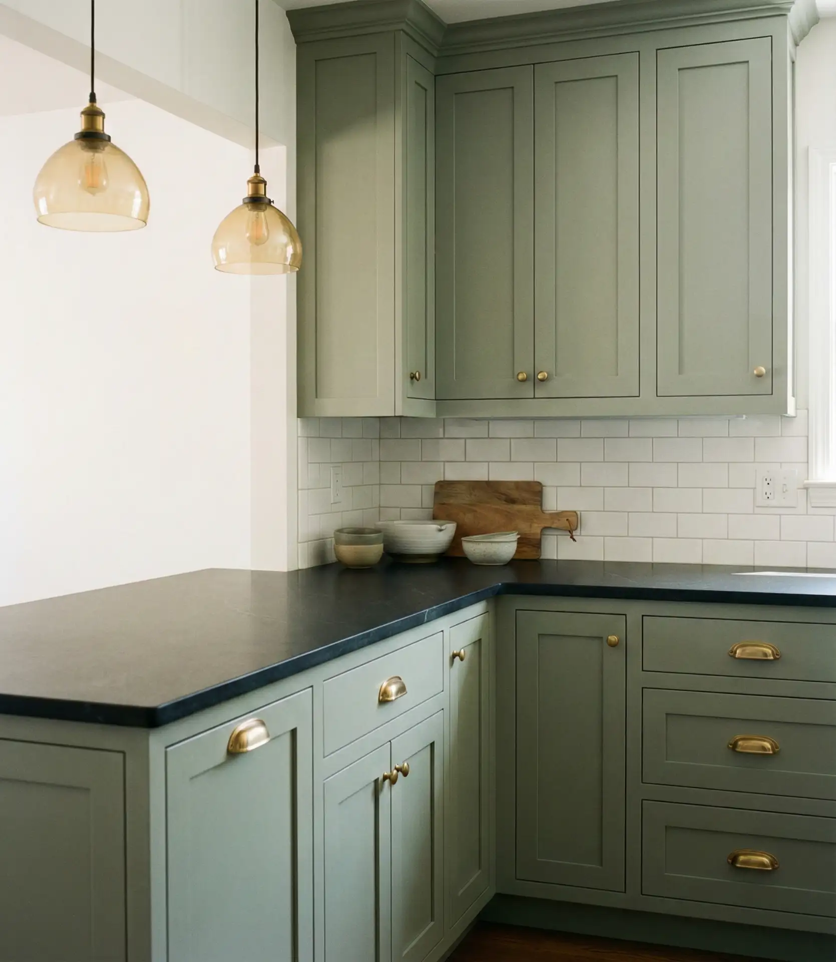 Sage Green Cabinets with Black Countertops 2