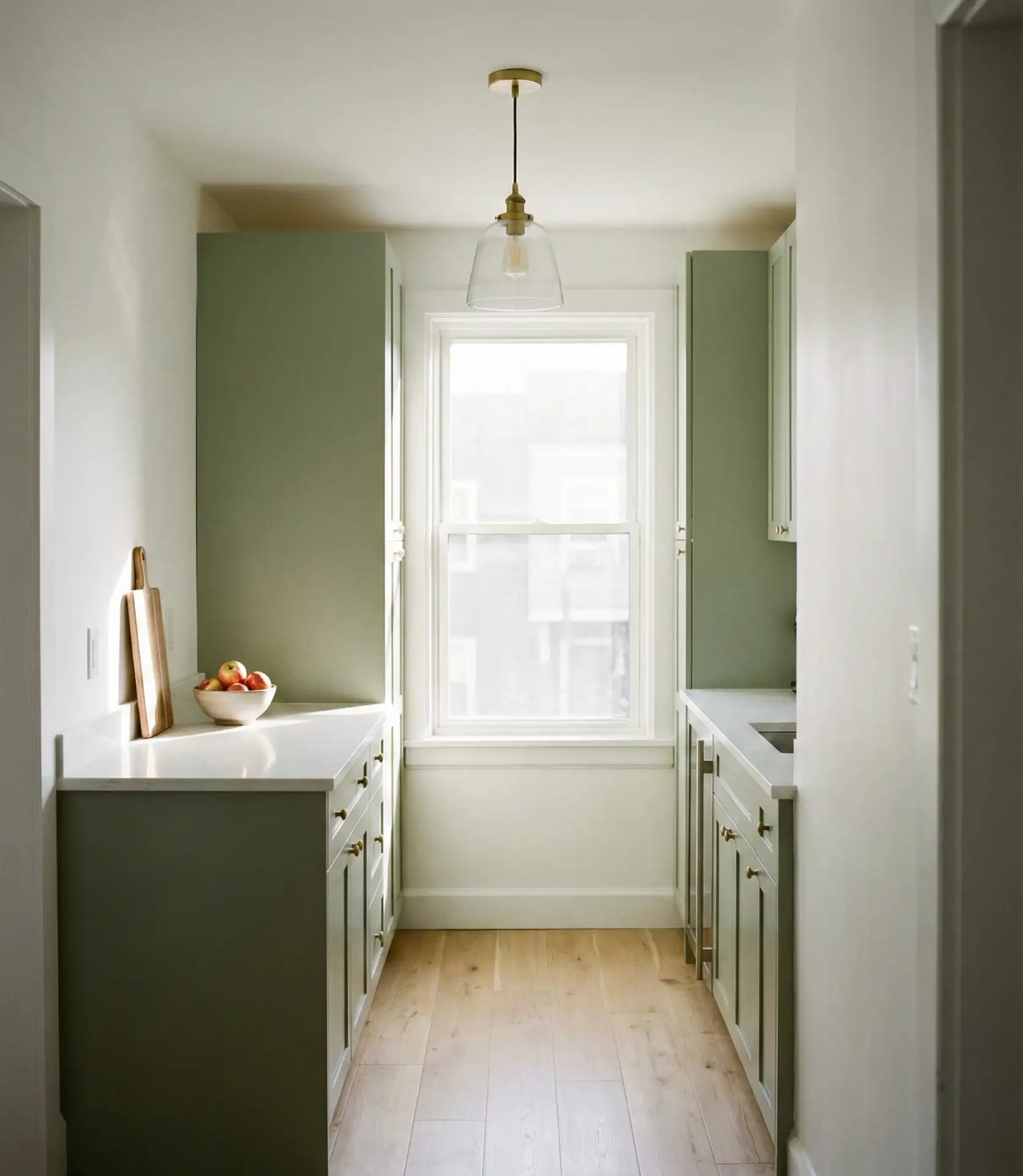 Sage Green Cupboards in a Small Kitchen 1