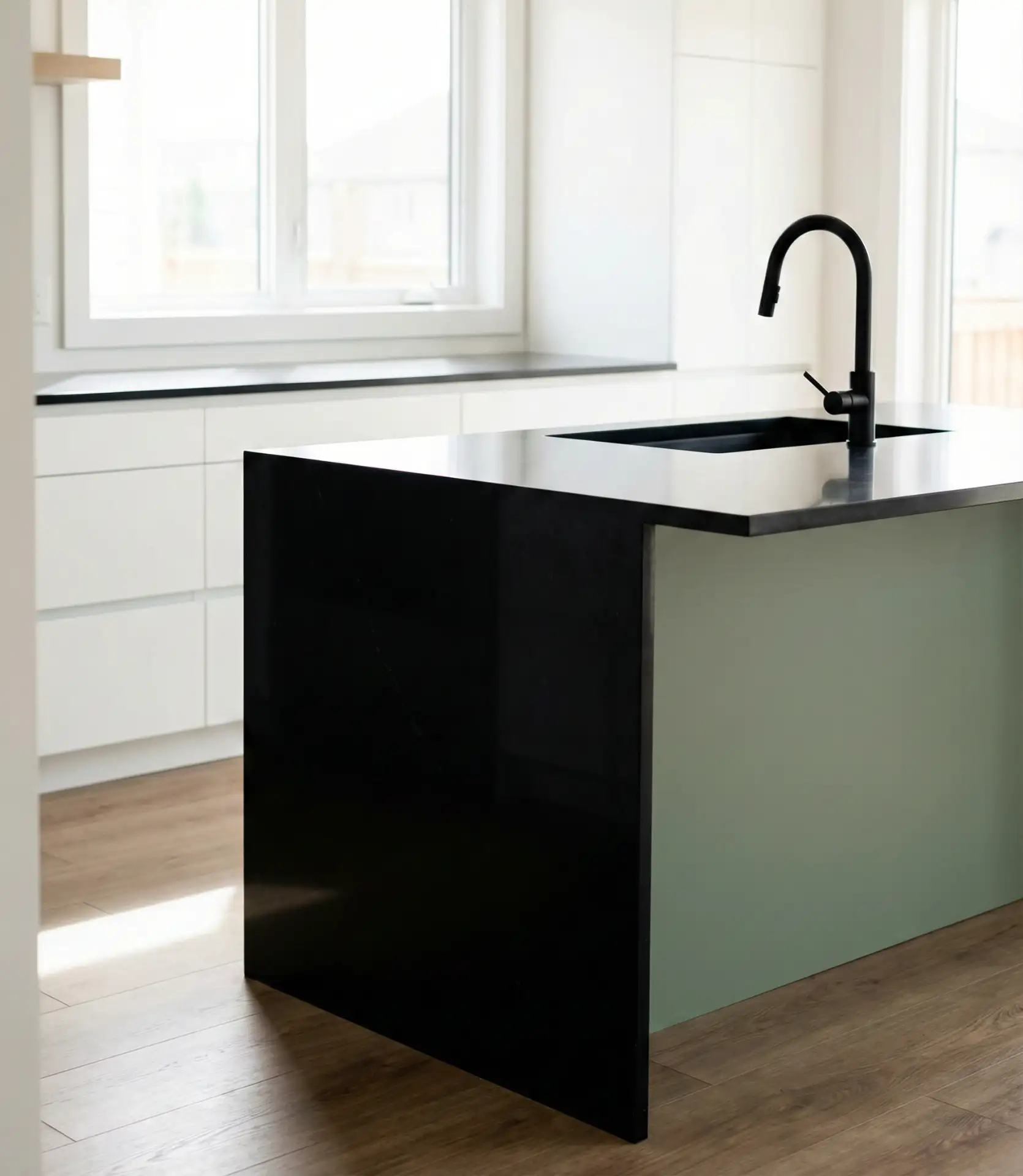 Sage Green Kitchen with Black Countertop Contrast 1