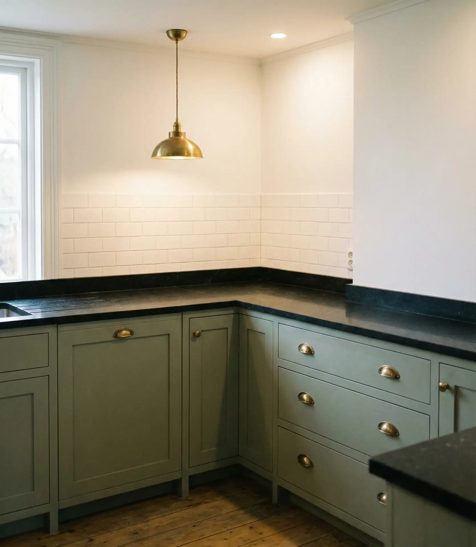 Sage Green Kitchen with Black Countertop Contrast 2
