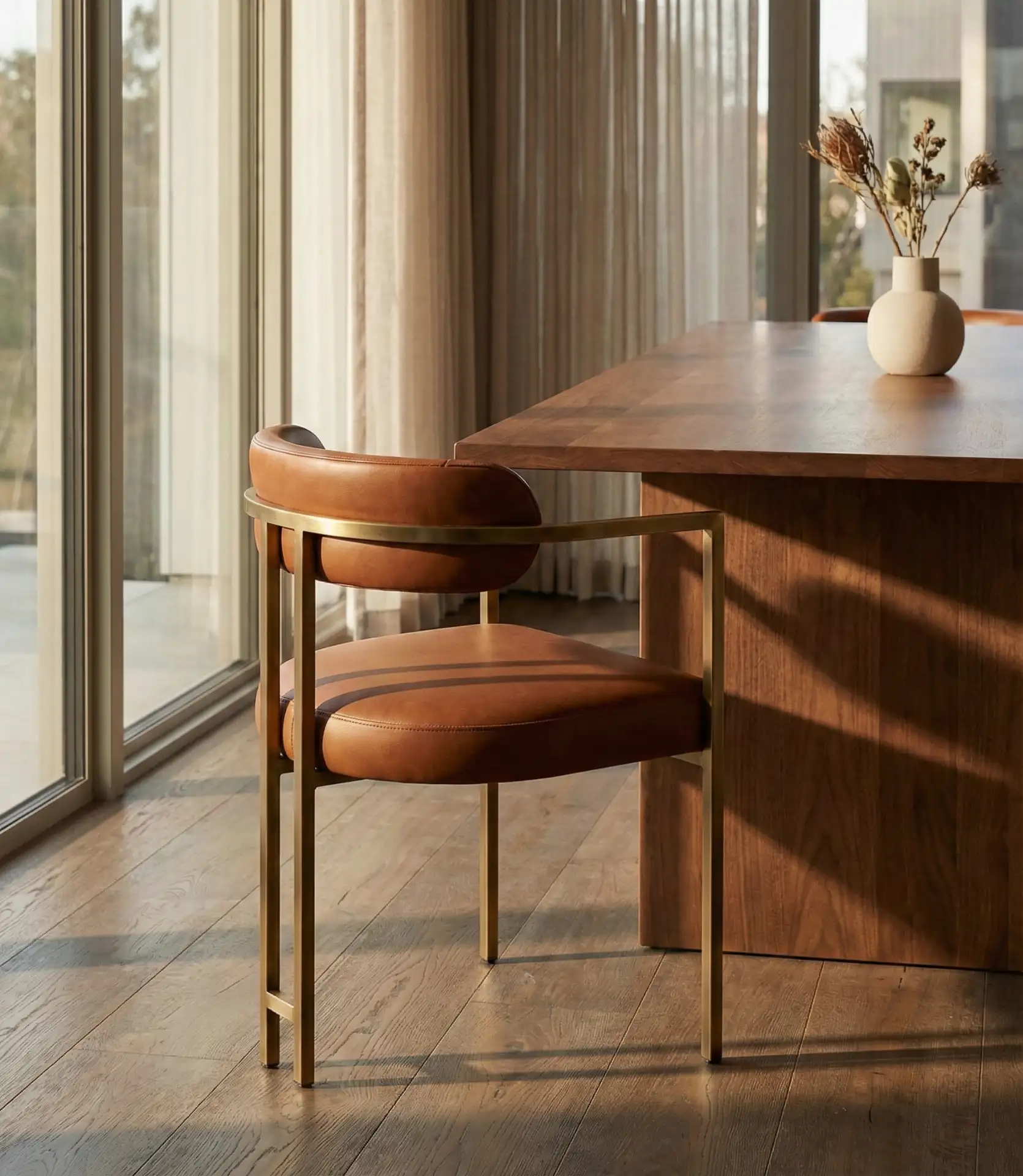 Sculptural Leather Dining Chairs with Metal Accents 2