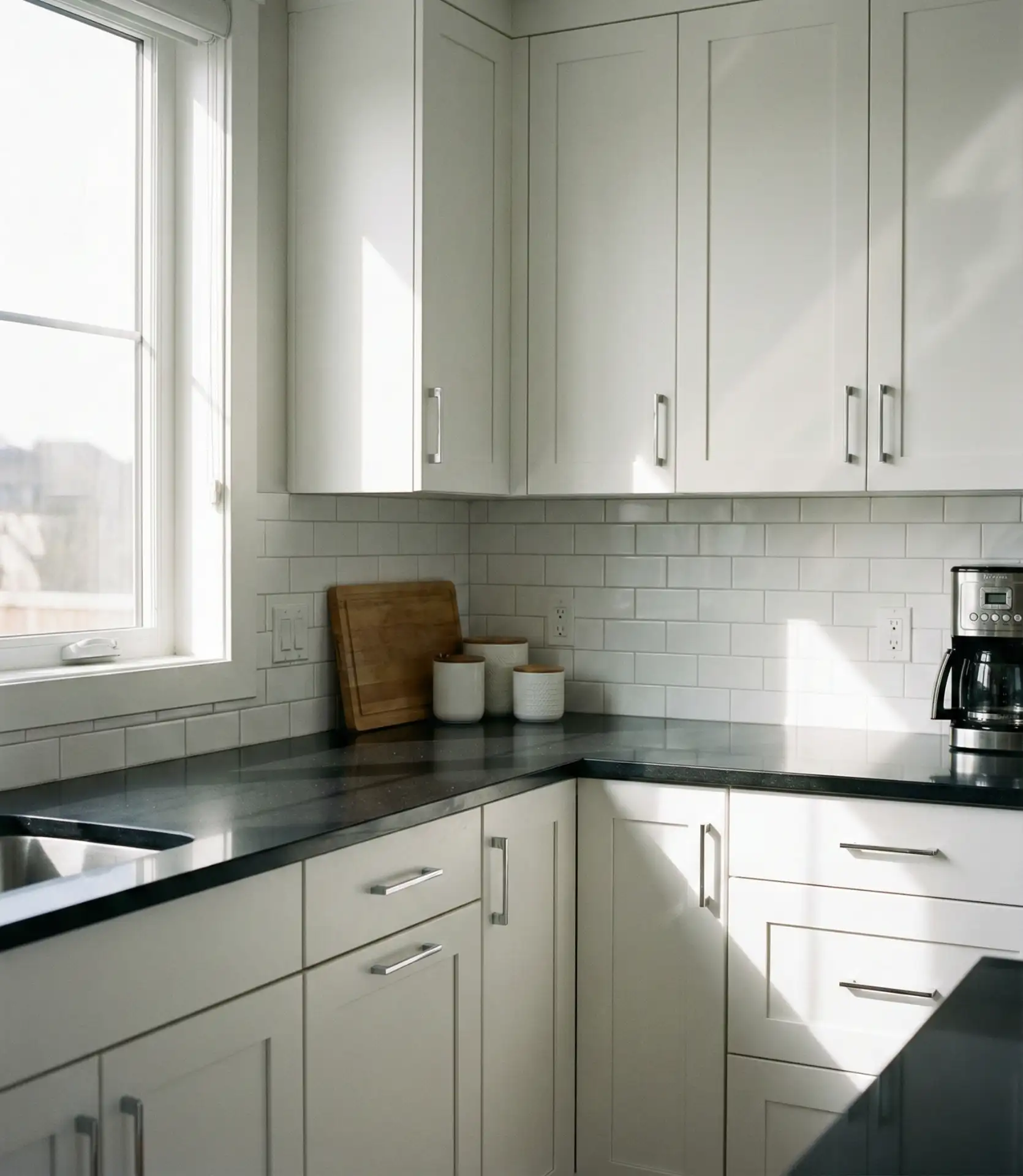 Sleek Black Quartz with Minimalist Hardware 1