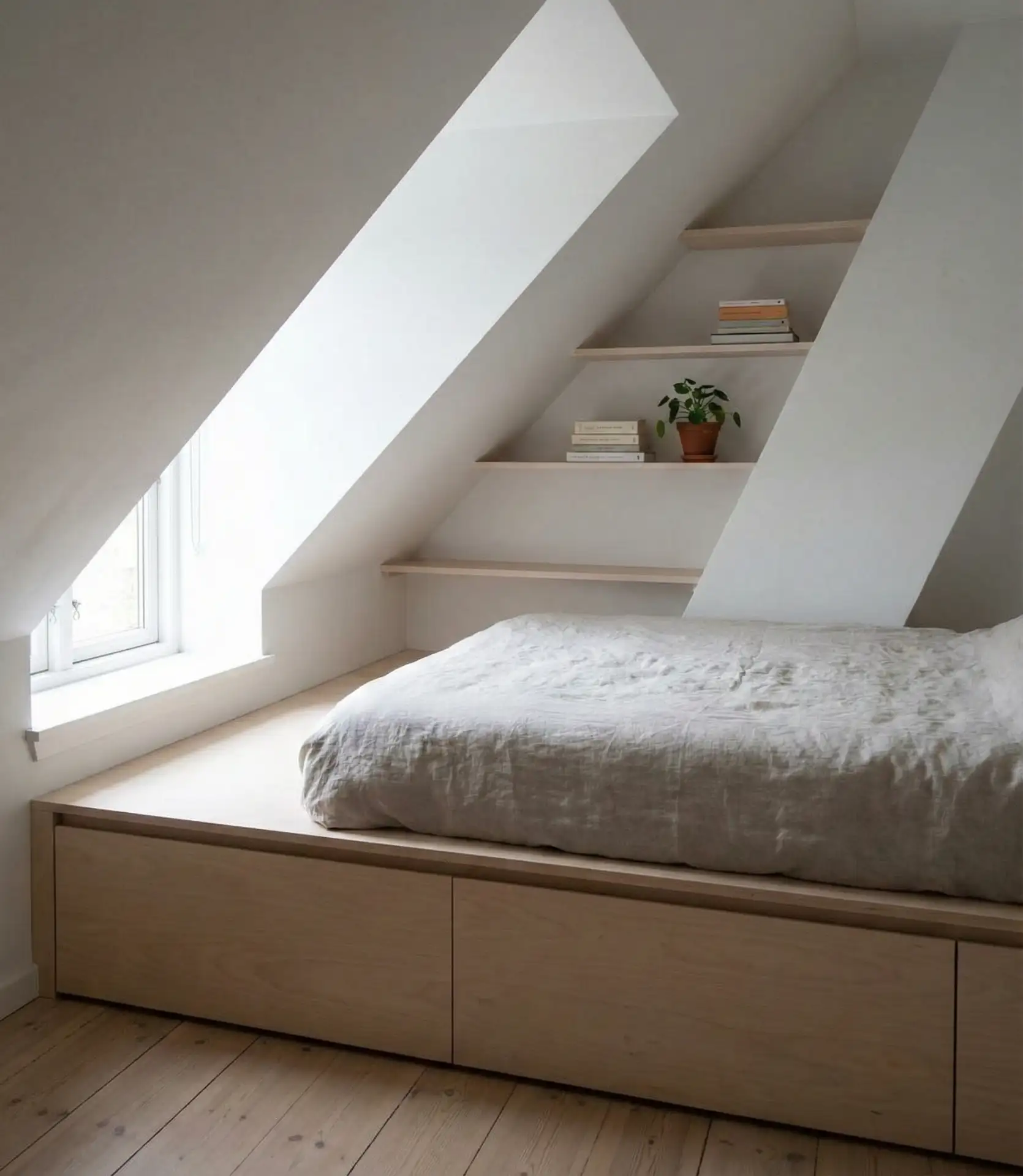 Tiny Attic Bedroom with Built-In Storage 2