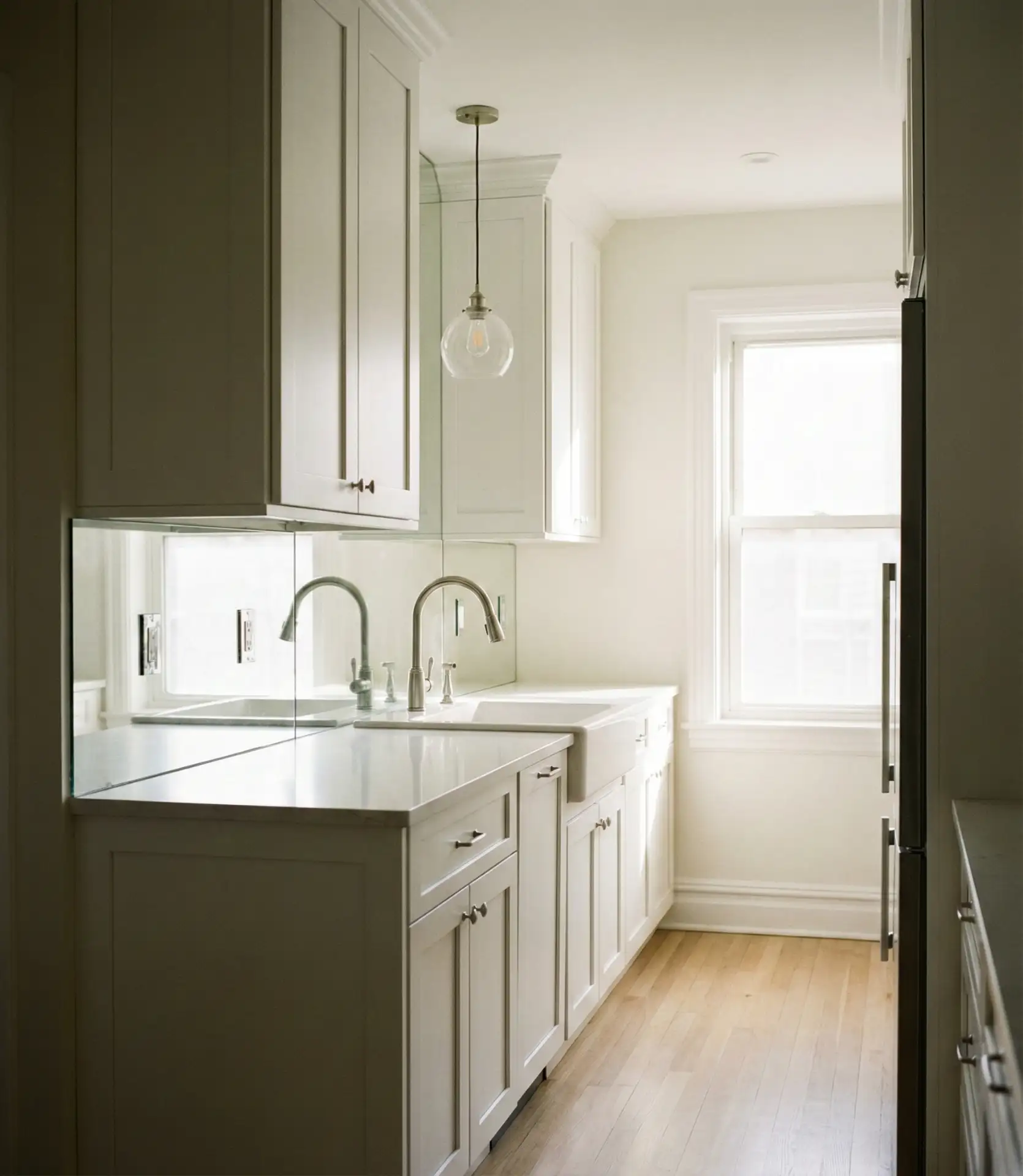 Tiny Galley with Mirrored Backsplash 1