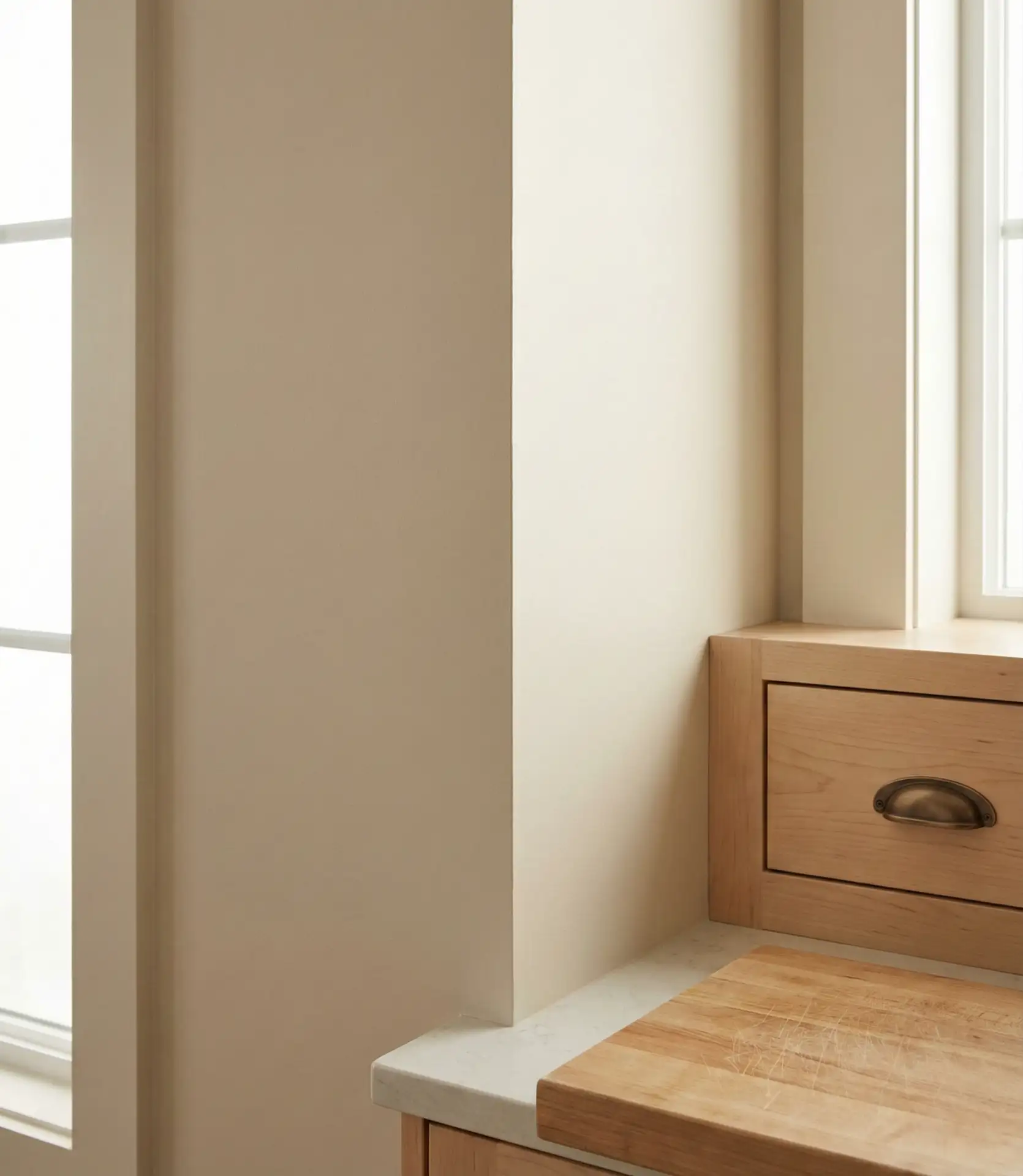 Warm Beige Walls Complementing Honey Maple Cabinets 1