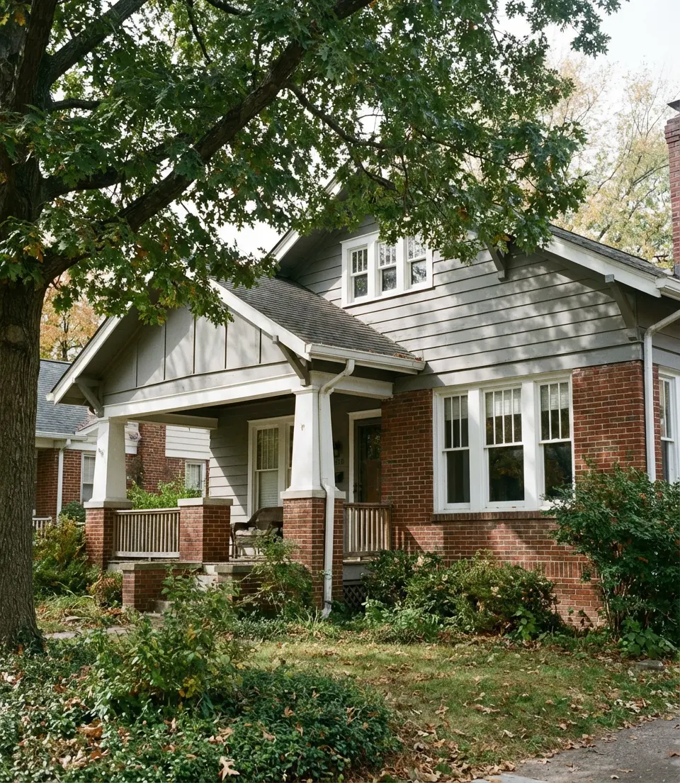 Soft Gray With White Windows on a Brick Bungalow 1