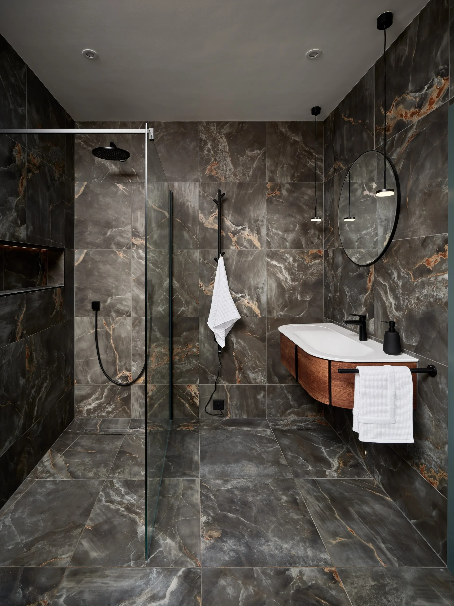 Bathroom Design: Moody Ensuite With Dark Onyx-Effect Tiles And Black Brassware