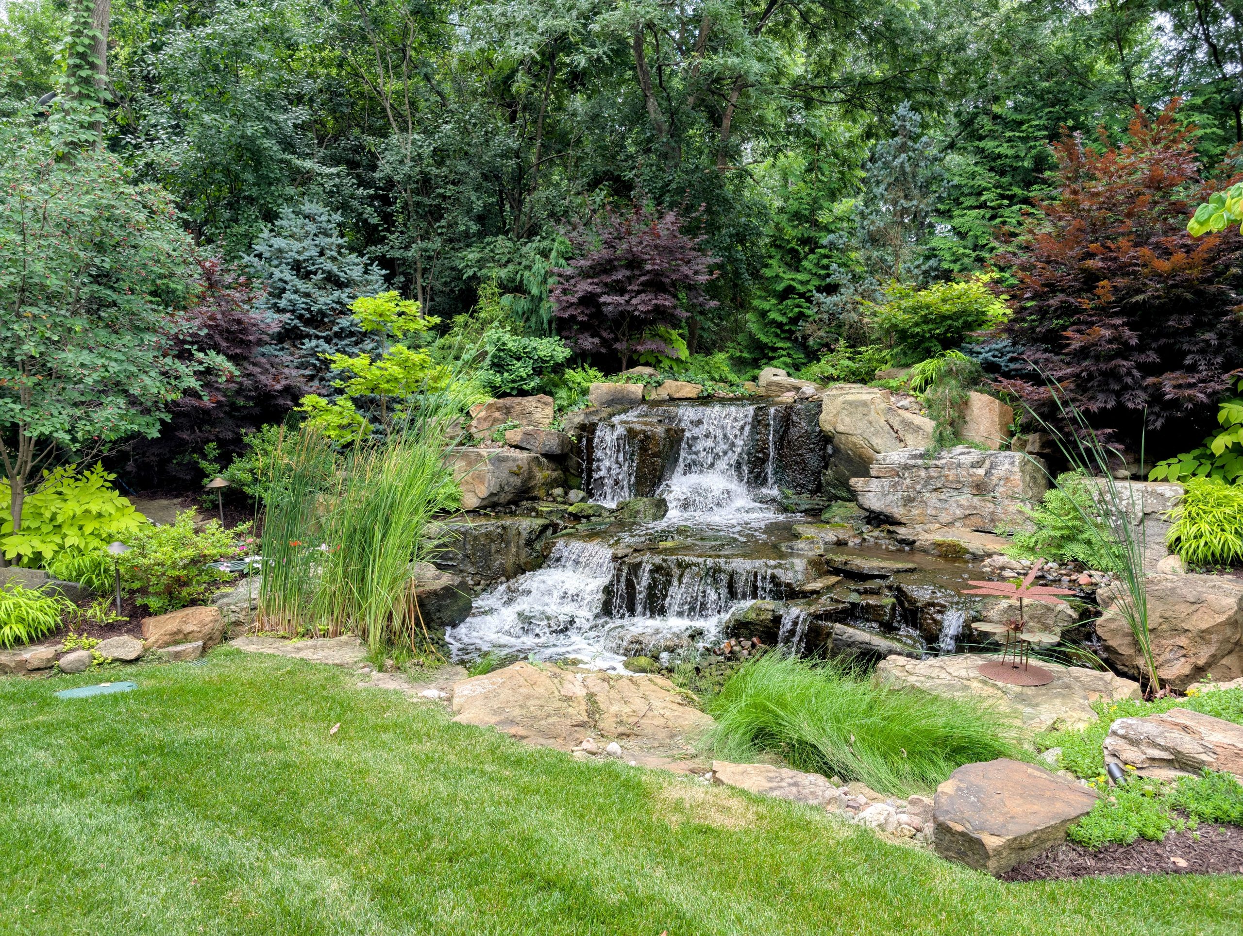 Driveway entrance waterfall 😁 : r/landscaping