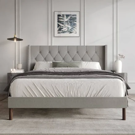 Castle Place Upholstered Wingback Bed...