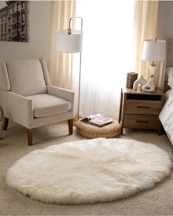 Oval Shaped Sheepskin Rug - Ivory