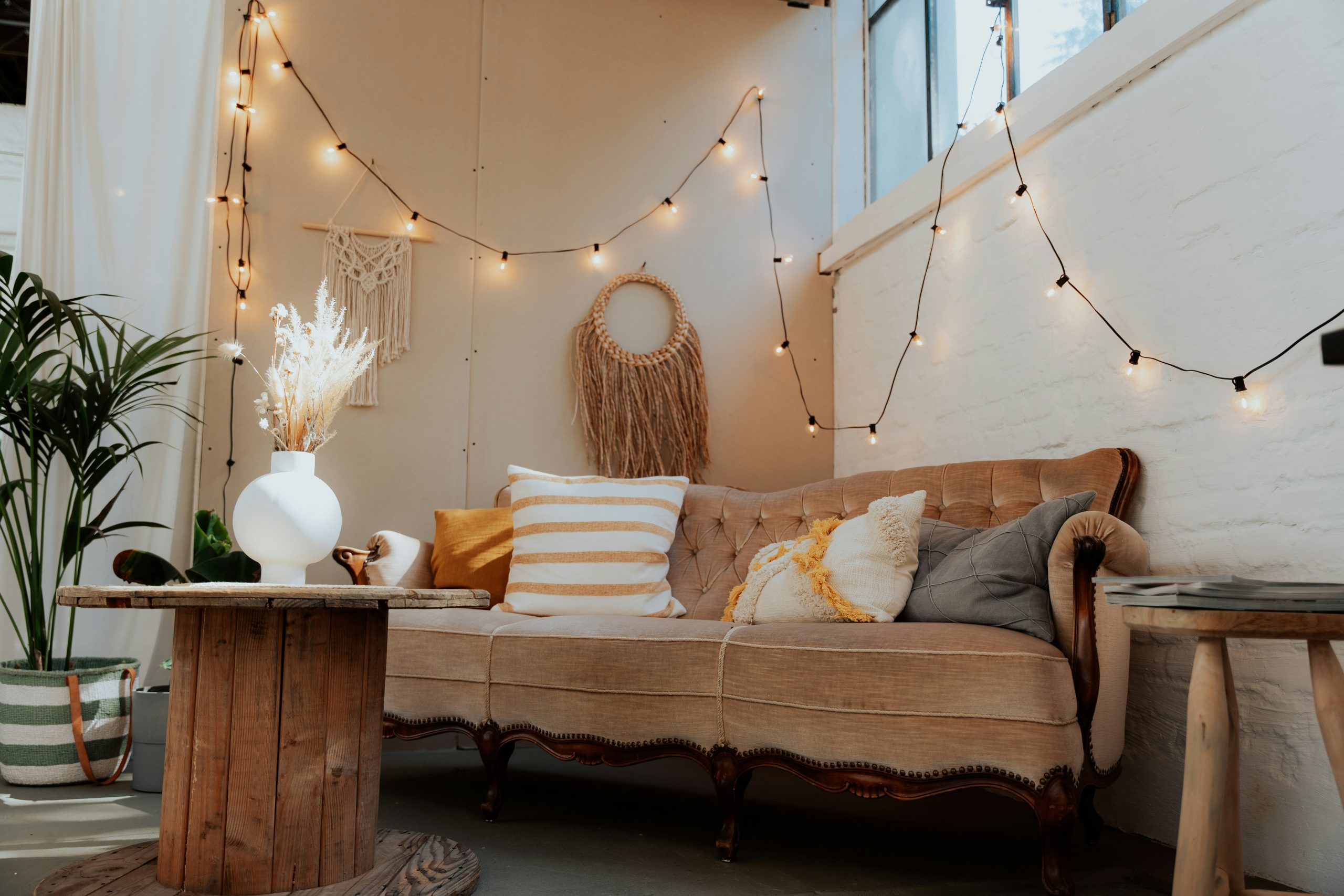 A living room with a couch and a table