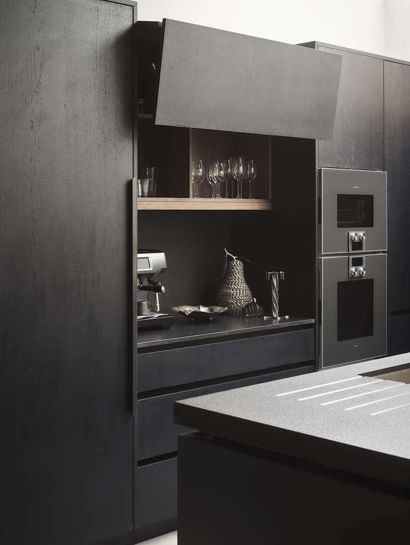 Black kitchen trend: How to warm up a bold minimalist kitchen