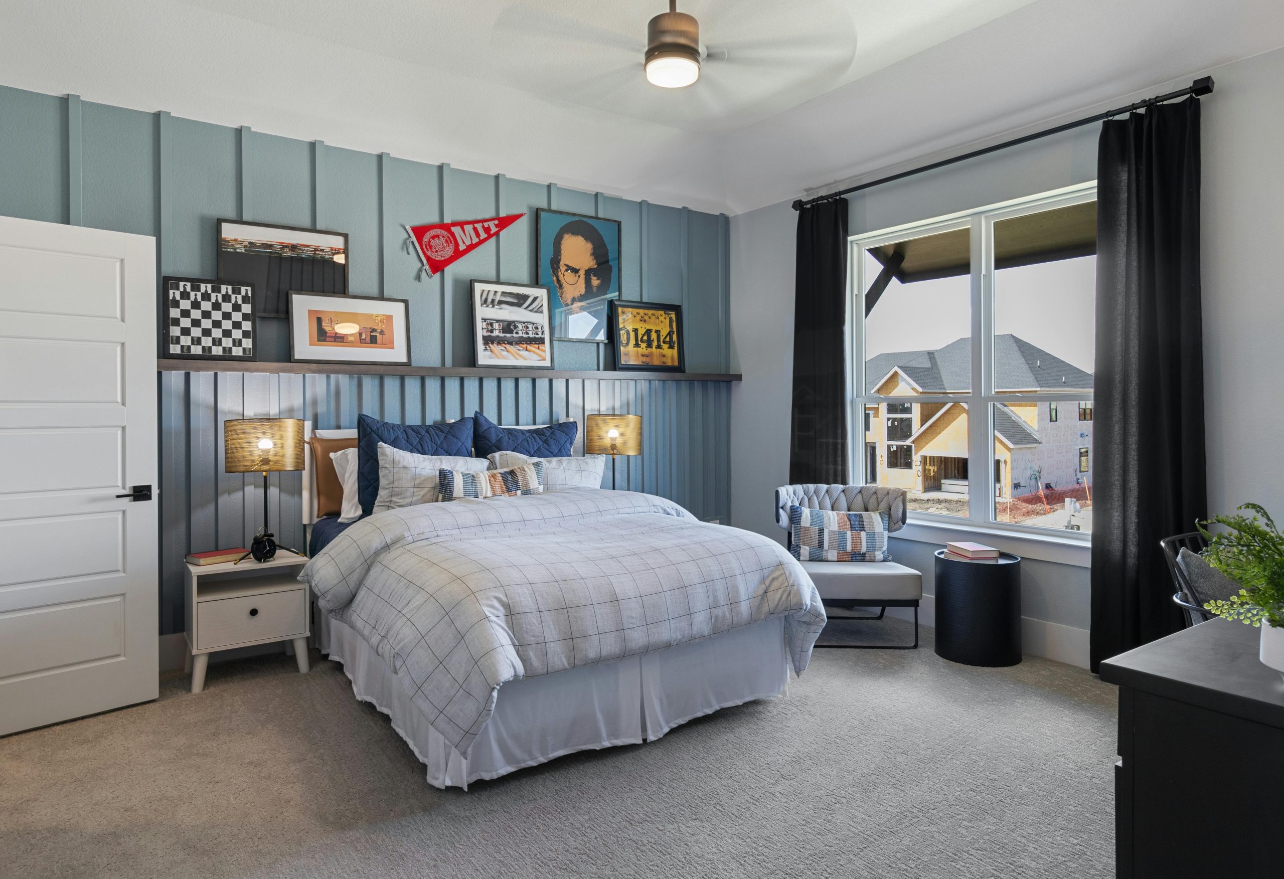 Contemporary teenage bedroom with stylish decor and comfortable bed.