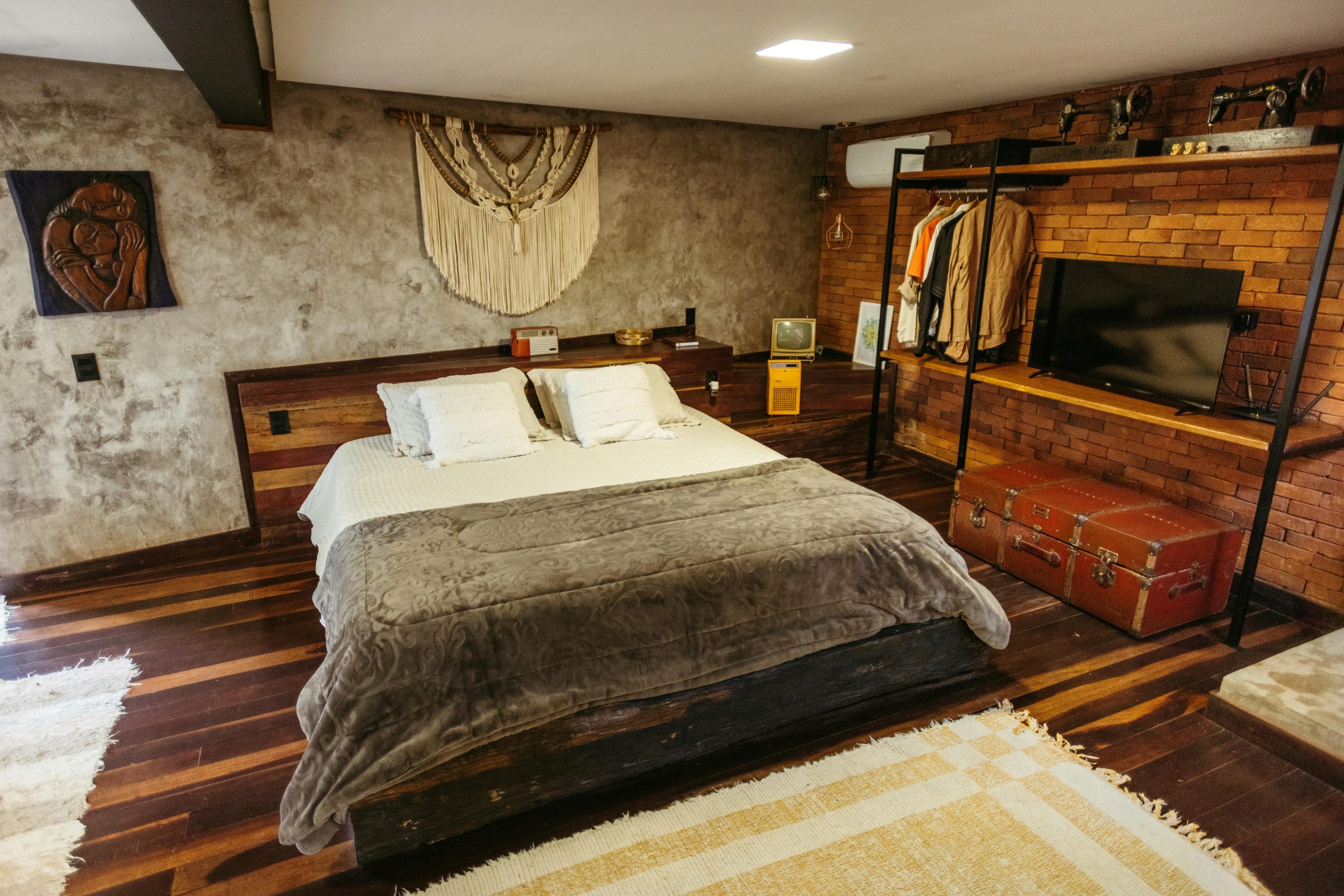 Inviting rustic-style bedroom with modern amenities in Santa Teresa, Brazil Airbnb.