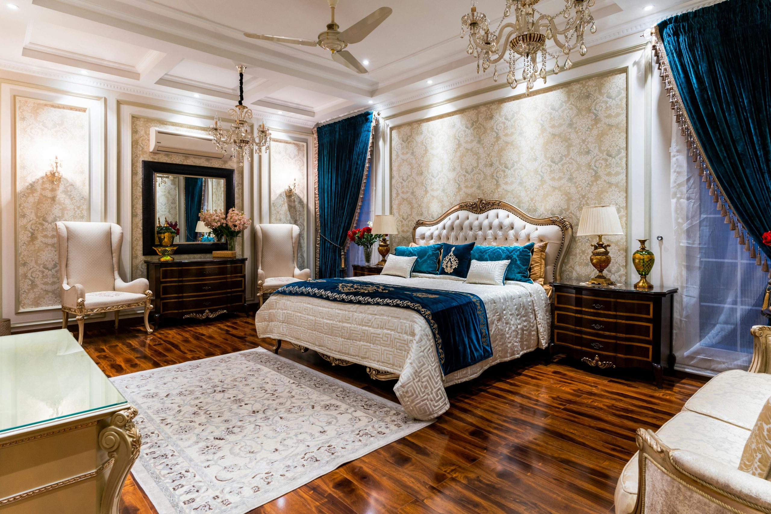 Luxurious bedroom featuring classic decor and opulent furnishings in a sophisticated setting.