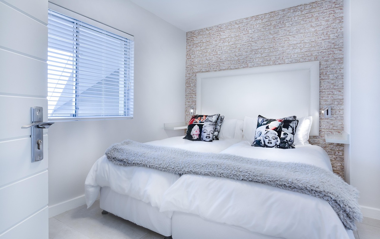 modern minimalist bedroom, bedroom, bed, bedding, pillow, lamp, furniture, room, contemporary, indoors, inside, interior, interior design, white, light, clean, apartment, architecture, nobody, blue li