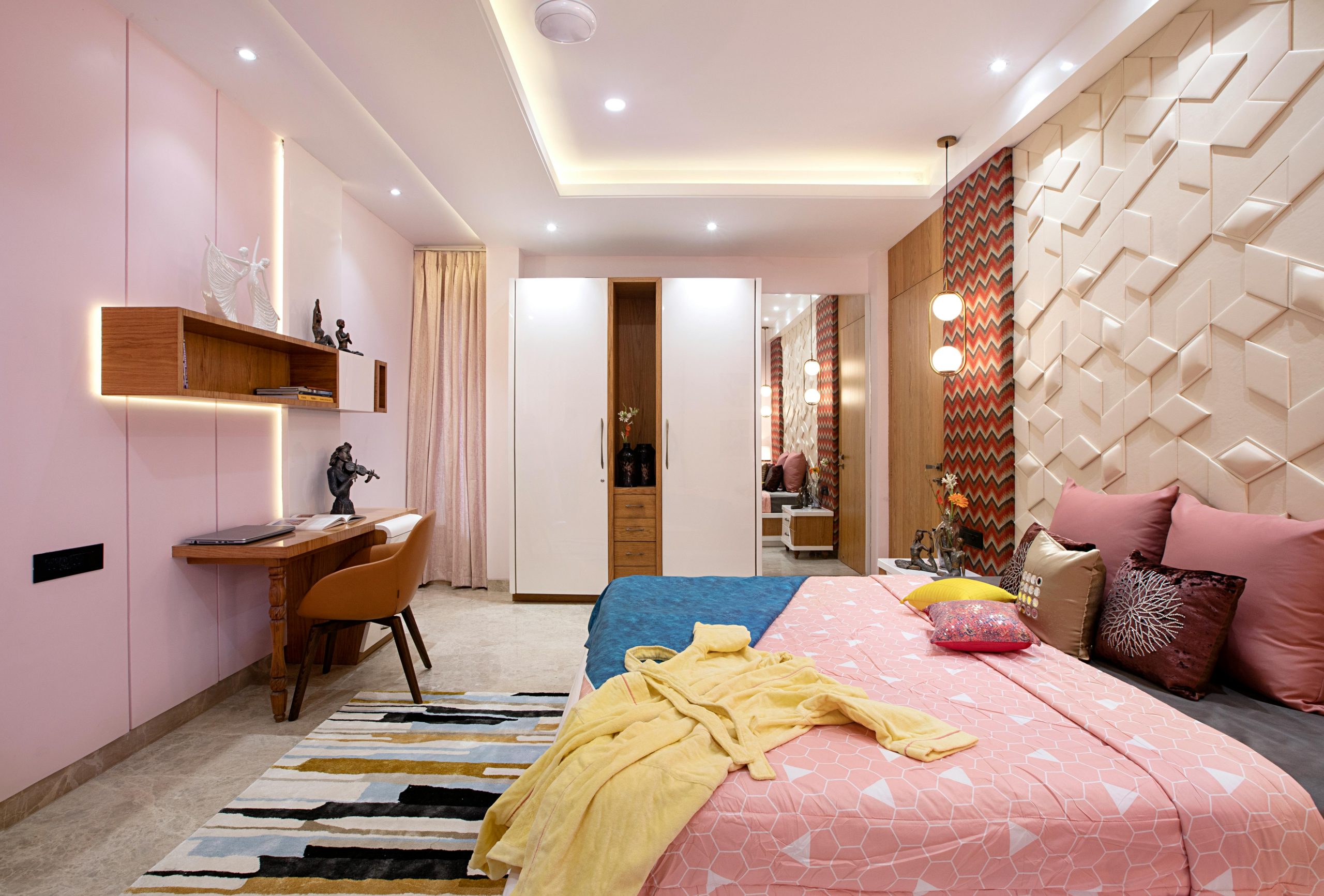 pink paneled wall bedroom