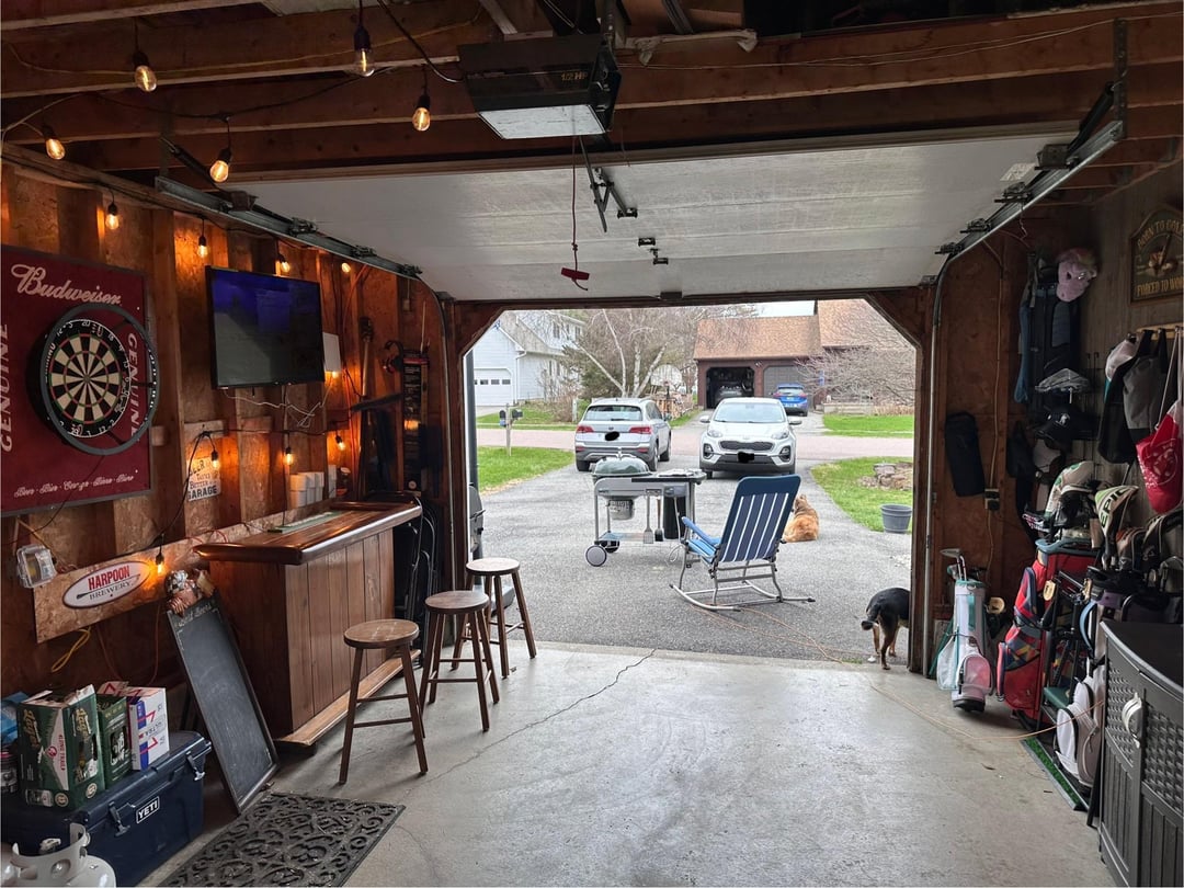 The garage bar has came a long way since last fall when I put it together. Loving grilling out here tonight!! : r/mancave