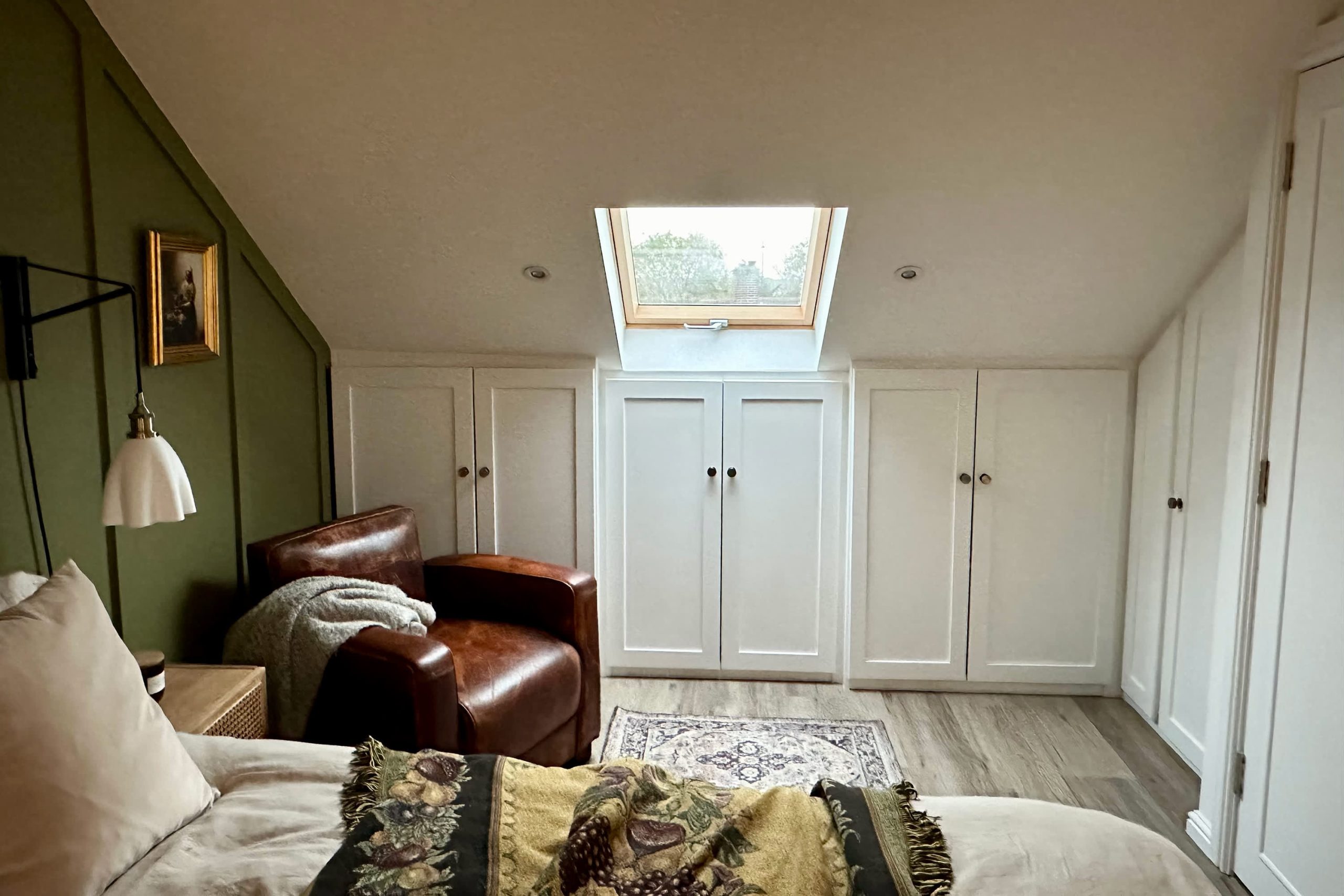 $2,500 DIY Storage Maximizes an Attic Bedroom's Sq. Footage | Apartment Therapy