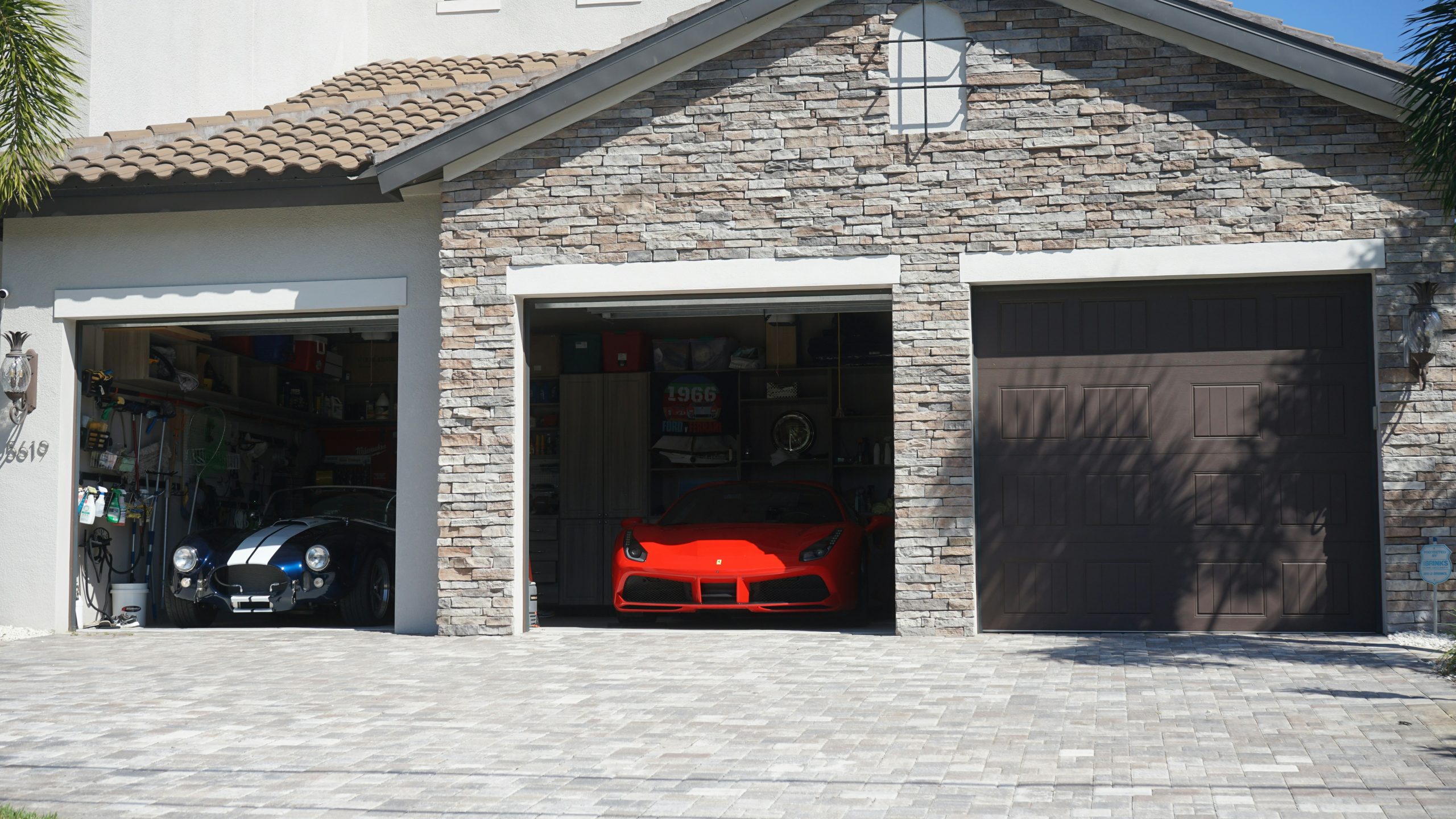 a car is parked in the garage of a house