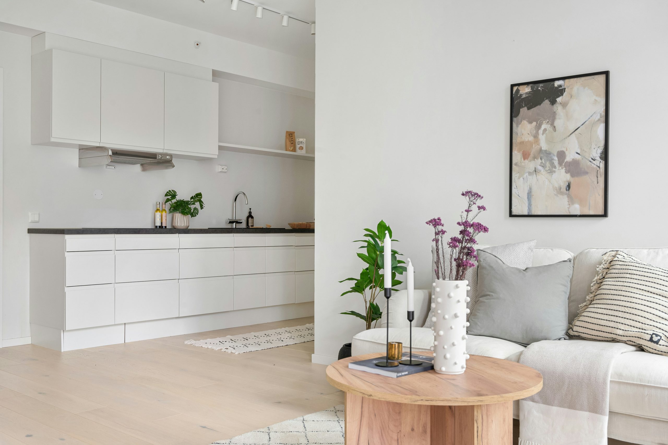 A living room filled with furniture and a white couch