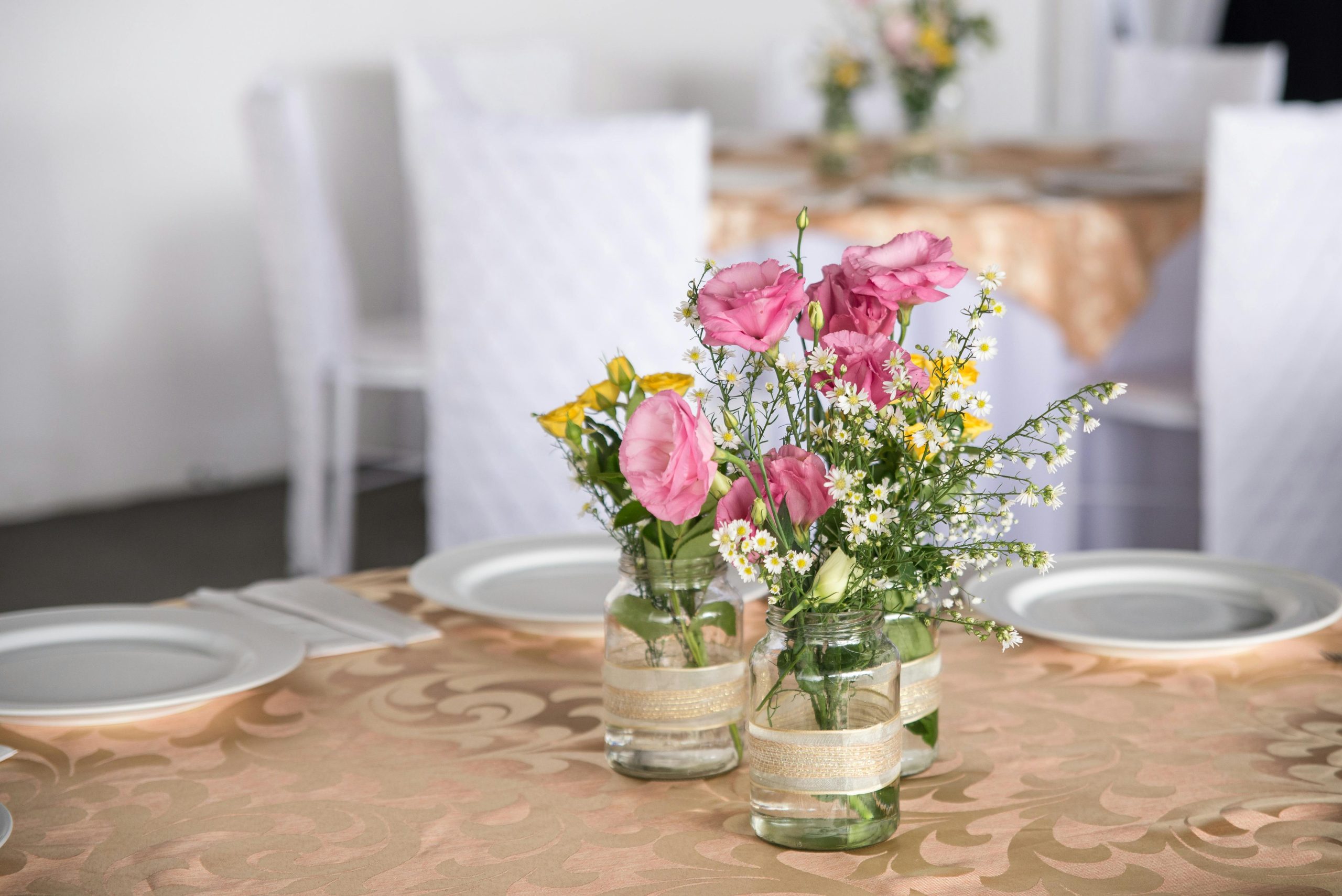 Beautiful floral arrangement on a table setting perfect for weddings and special events.