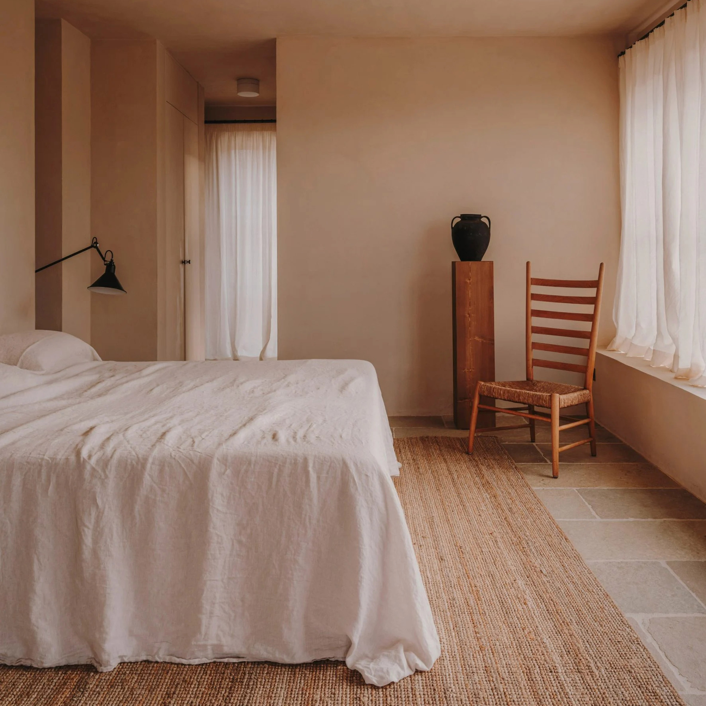 Ten earthy bedrooms that use natural colours and textures
