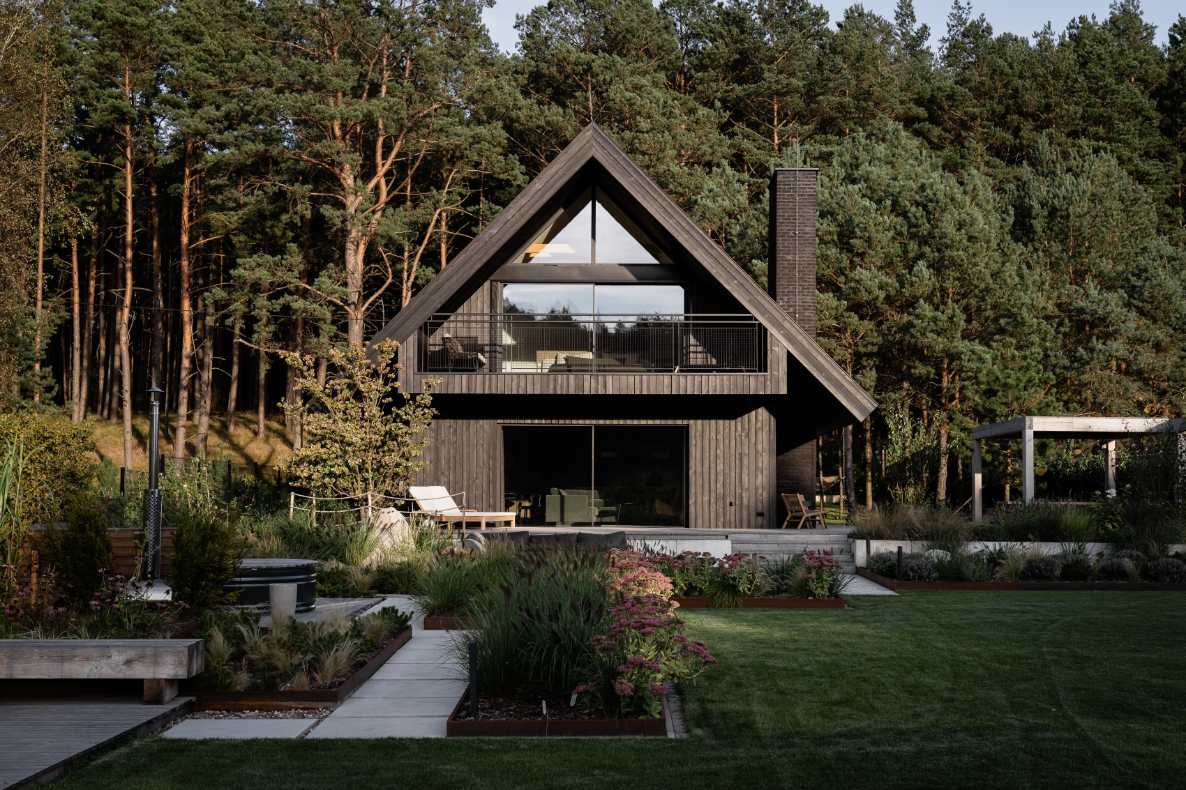 They built it near the woods. The house blends into the landscape