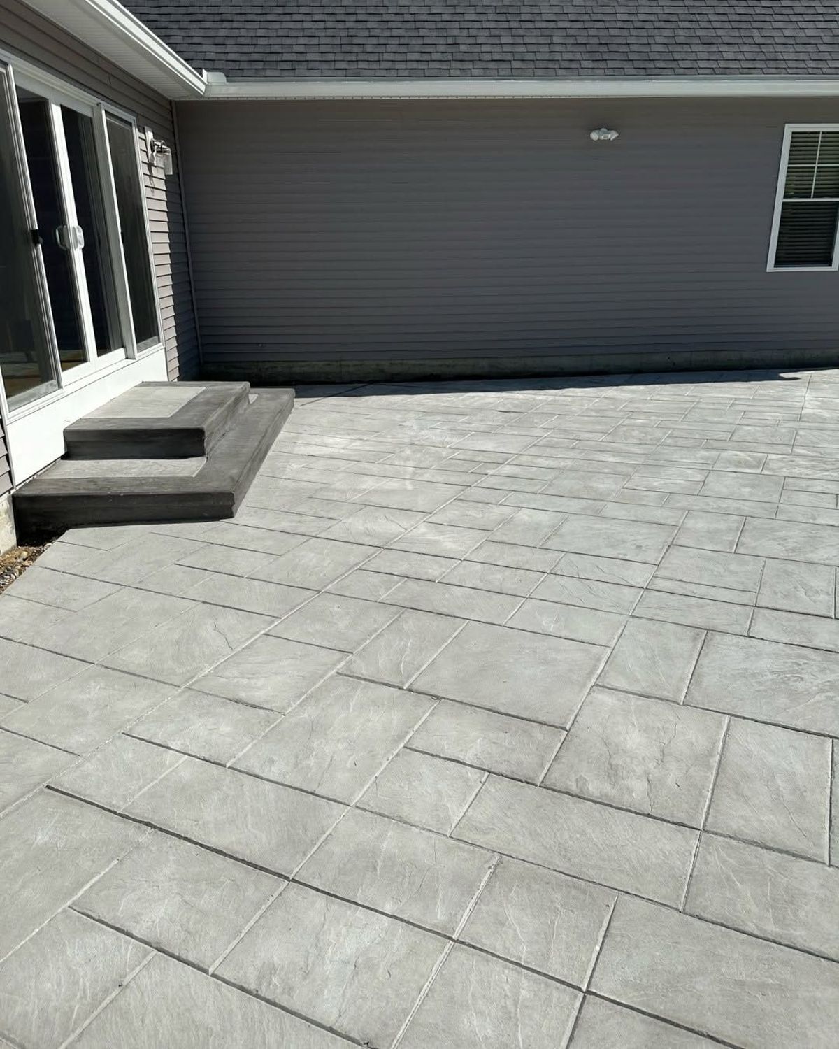 14 Stamped Concrete Ideas for 2026 That Replace Traditional Pavers