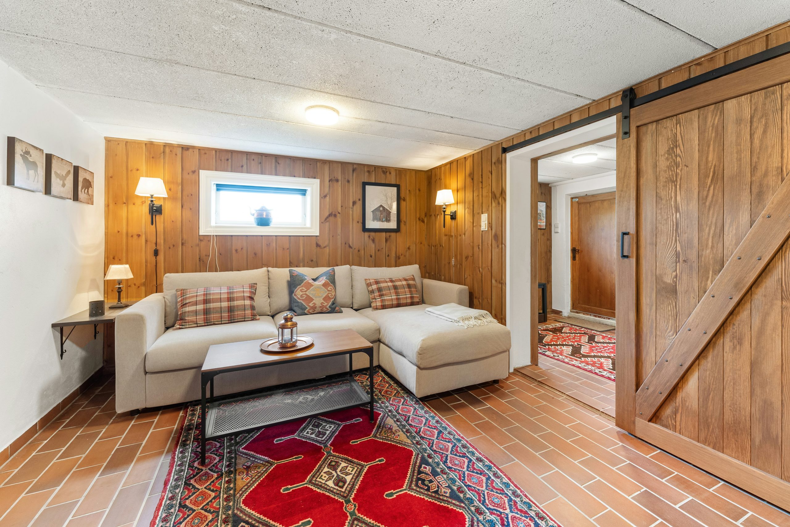 A living room filled with furniture and a sliding door
