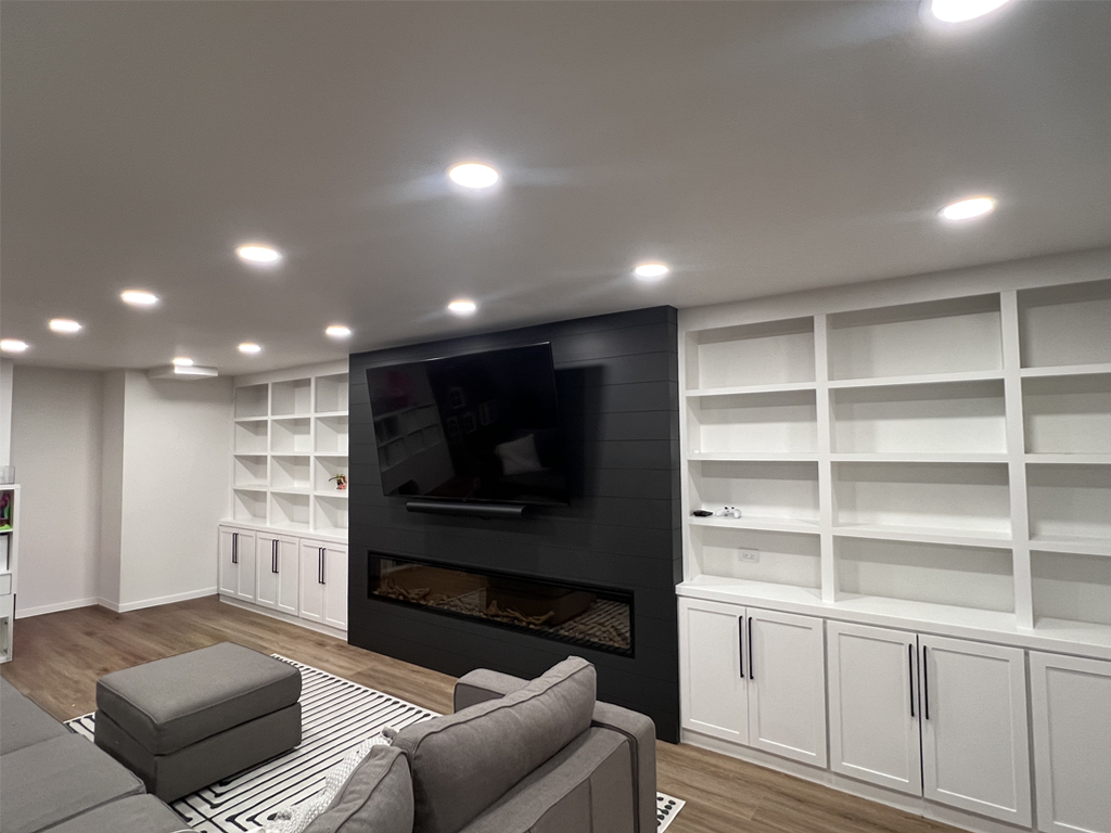 Basement finishing with TV wall & Custom bookcase – Chicago, IL – JackStone