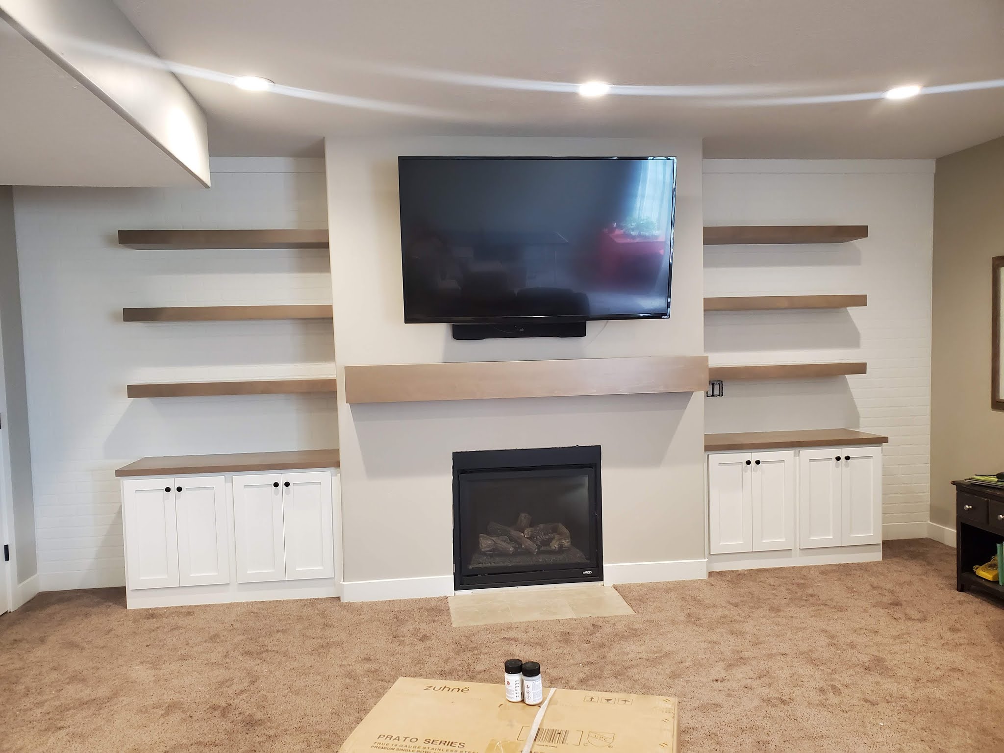 Basement updates: built-ins * kitchenette * stone fireplace | 320 * Sycamore