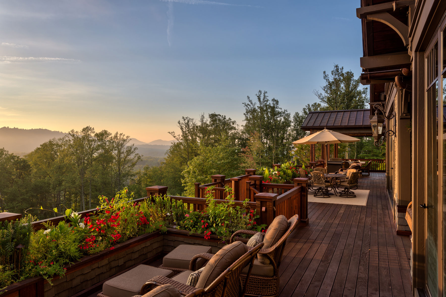 Mountains view of back deck at sunset | ACM Design Architecture & Interiors