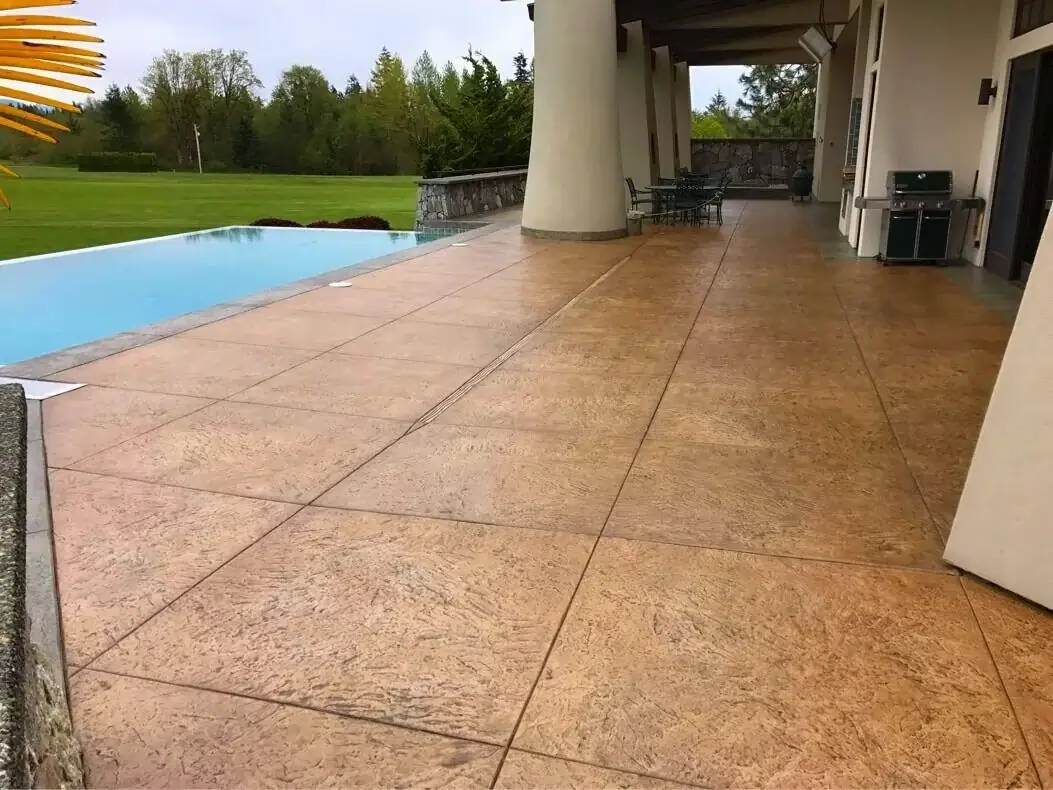 Stamped Concrete Patio with Pool Deck and Integrated Lighting in Bellevue, WA | RC Concrete Projects