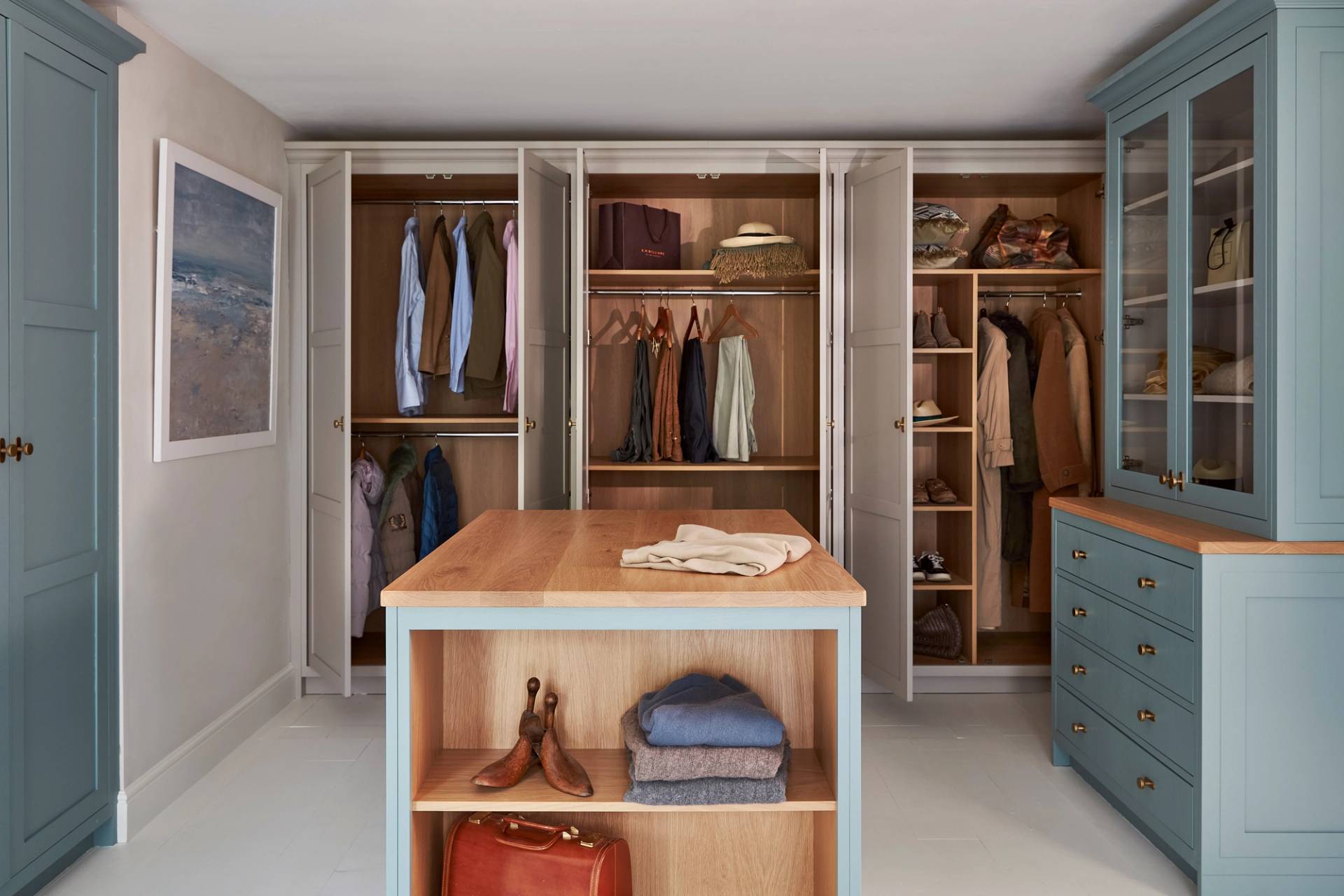 The Hall dressing room – a beautifully custom walk-in closet in soft blues and oak.