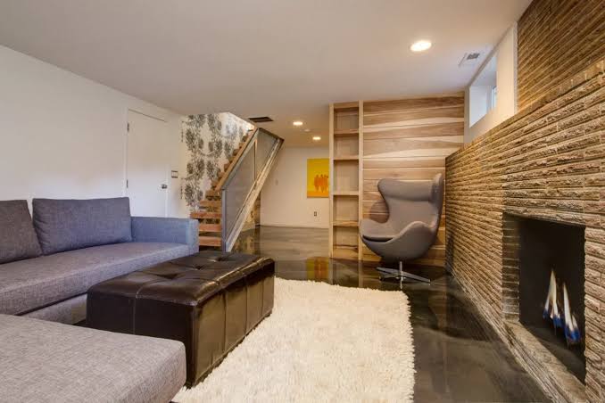 Transitional Basement Features Custom Wall Storage Unit | HGTV