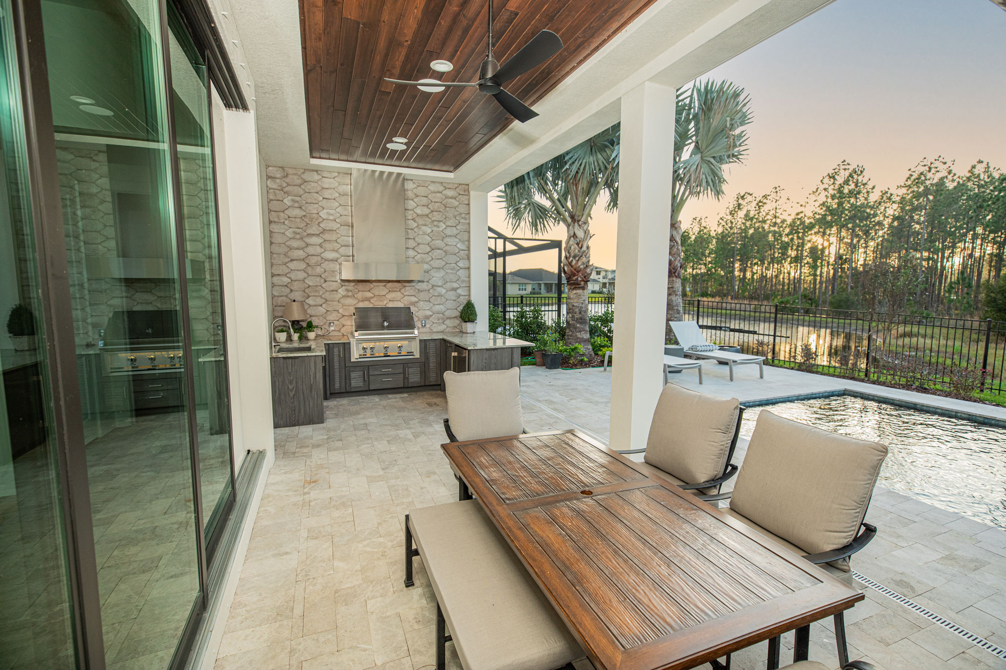 Custom Outdoor Kitchen With Vent Hood and Patio Extension With Gas Fire Pit in Land O Lakes - Tampa, FL - Just Grillin